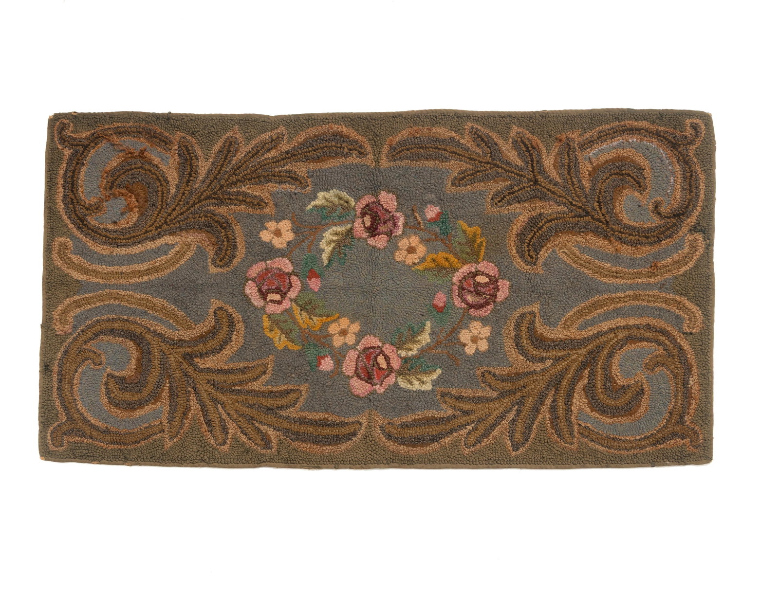 LARGE EARLY FLORAL HOOKED RUG.: LARGE EARLY FLORAL HOOKED RUG. American, 19th Century. Wool on burlap. Bright floral wreath in center with large corner flourishes. A few loose threads in one quadrant, but overall very good