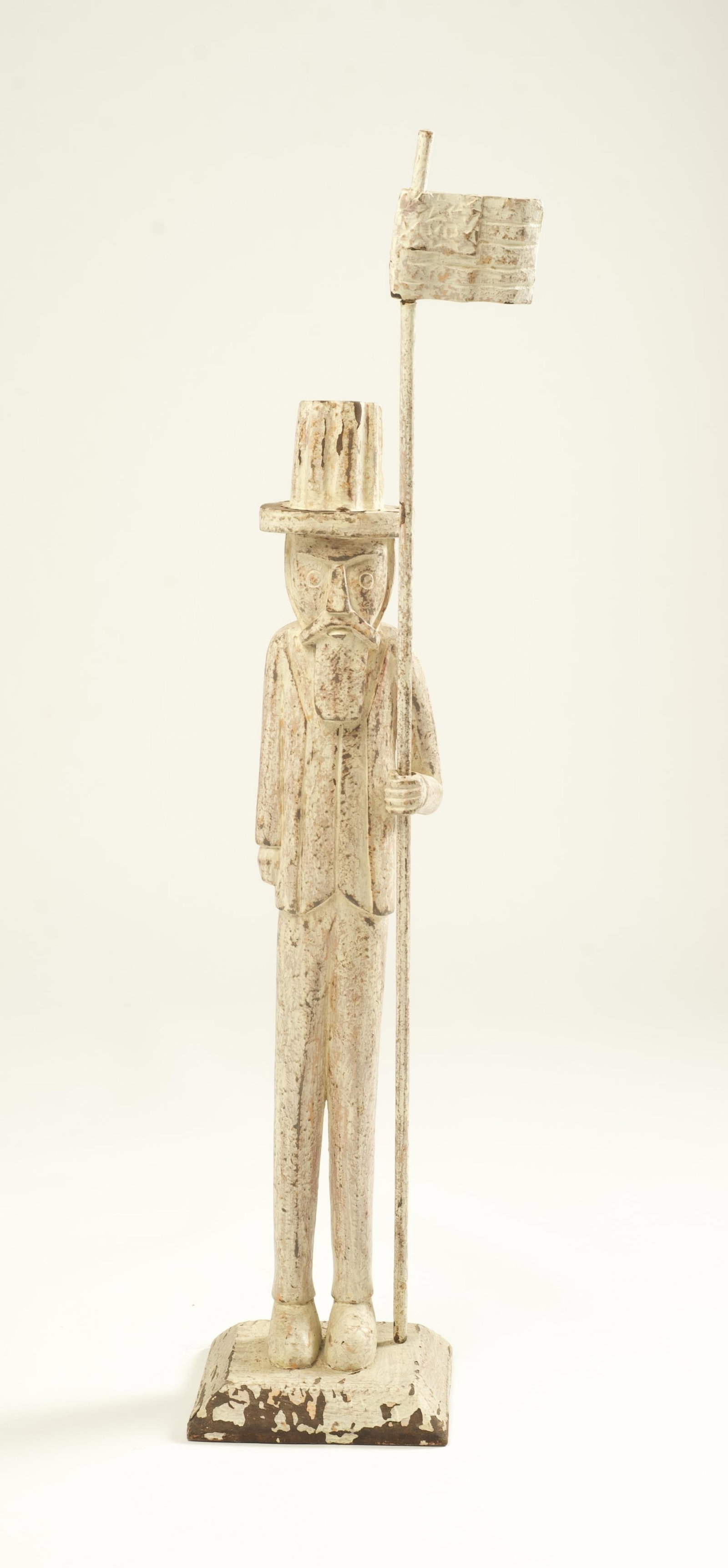 FOLKSY CARVED AND PAINTED FIGURE OF UNCLE SAM WITH FLAG. (1 of 7)