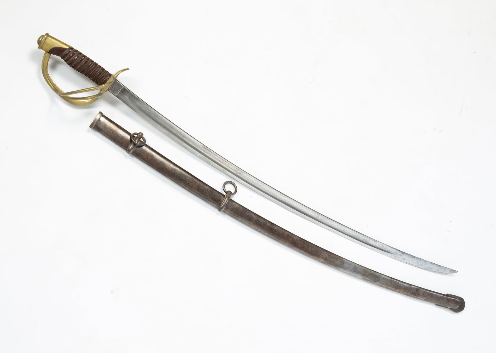 MODEL 1860 CIVIL WAR CAVALRY SWORD.: MODEL 1860 CIVIL WAR CAVALRY SWORD. American, Dated 1864. Ames Manufacturing Company, Chicopee, Massachusetts, mark near hilt on blade and on reverse "N.J. U.S. D.R. 1864", brass guard, twisted brass