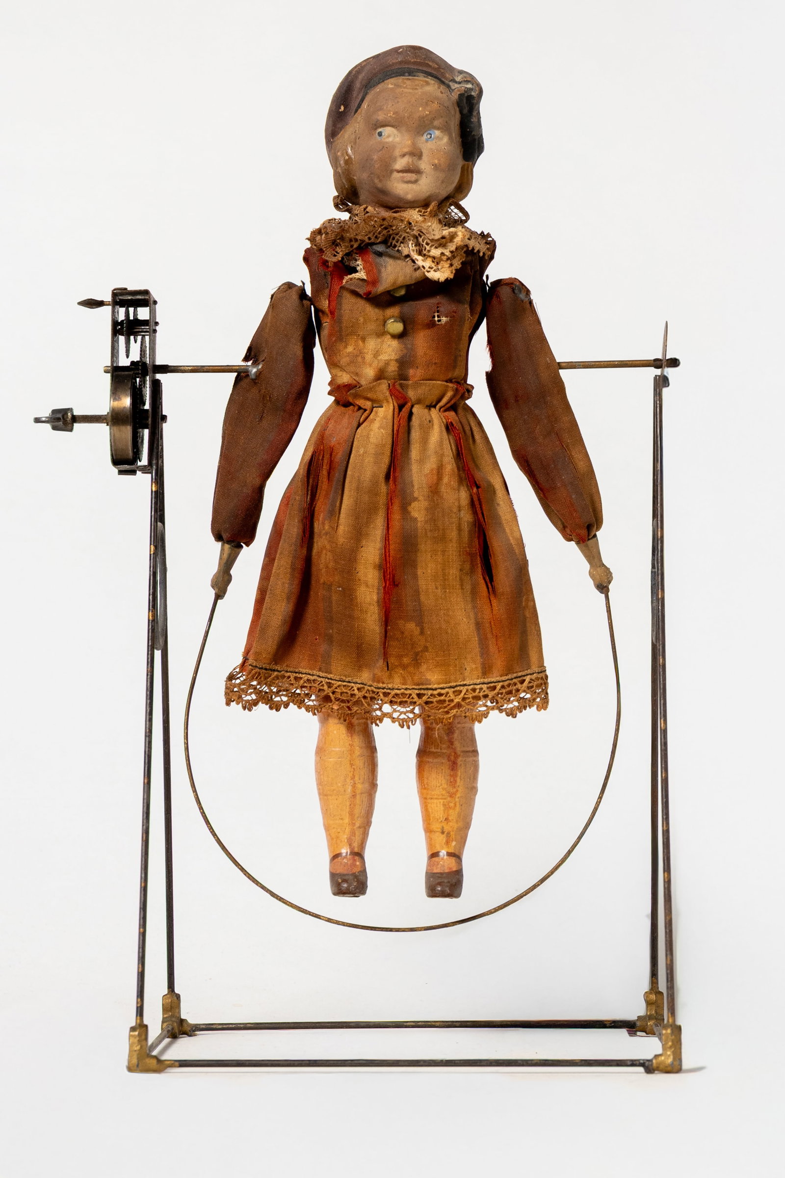 EARLY WIND UP GIRL JUMPING ROPE TOY. (1 of 7)