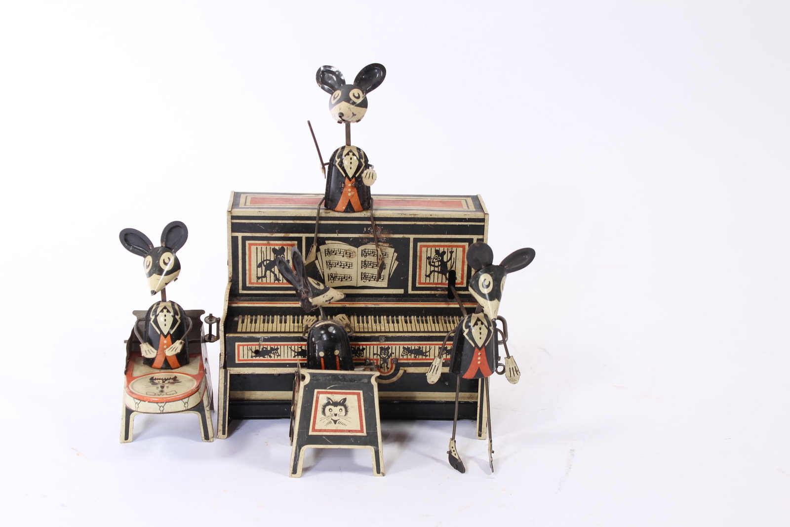 LOUIS MARX (NEW YORK, NEW YORK) TIN LITHO WINDUP MARX MERRYMAKERS MOUSE BAND.: LOUIS MARX (NEW YORK, NEW YORK) TIN LITHO WINDUP MARX MERRYMAKERS MOUSE BAND. American, 20th Century. Four-member mouse band, one seated conductor on top of piano, a seated drummer, a seated piano pla