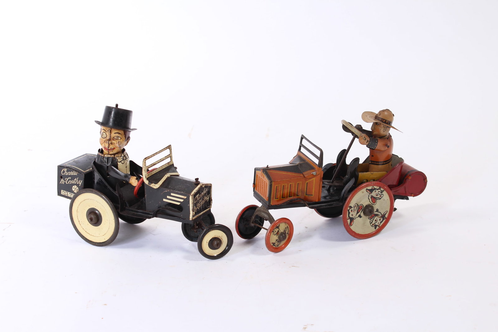 LOUIS MARX (NEW YORK, NEW YORK) TIN LITHO WINDUP COWBOY WHOOPEE CAR AND CHARLIE MCCARTHY CAR. (1 of 14)