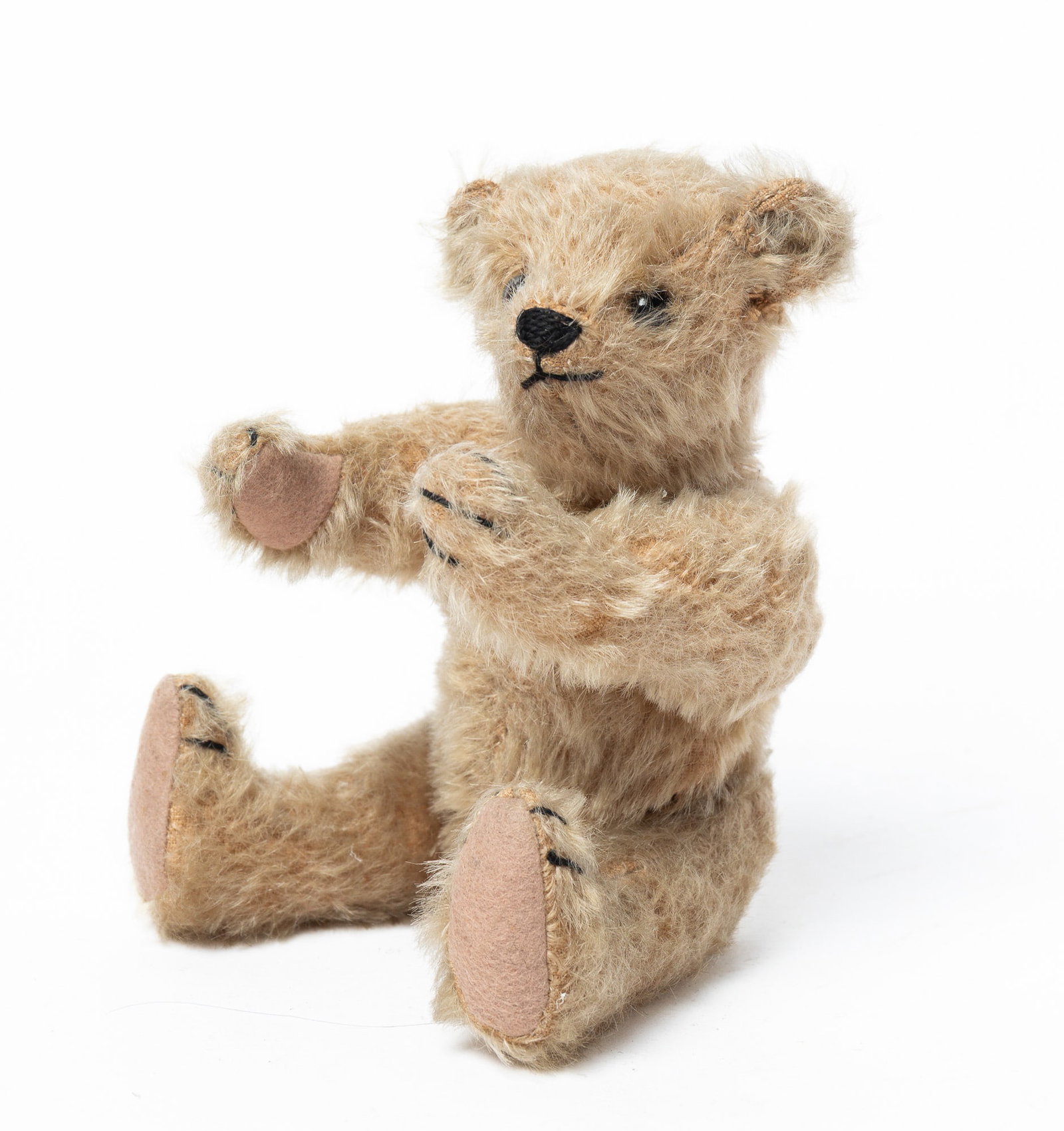 TAN MOHAIR ARTICULATED TEDDY BEAR, POSSIBLY STEIFF. (1 of 4)