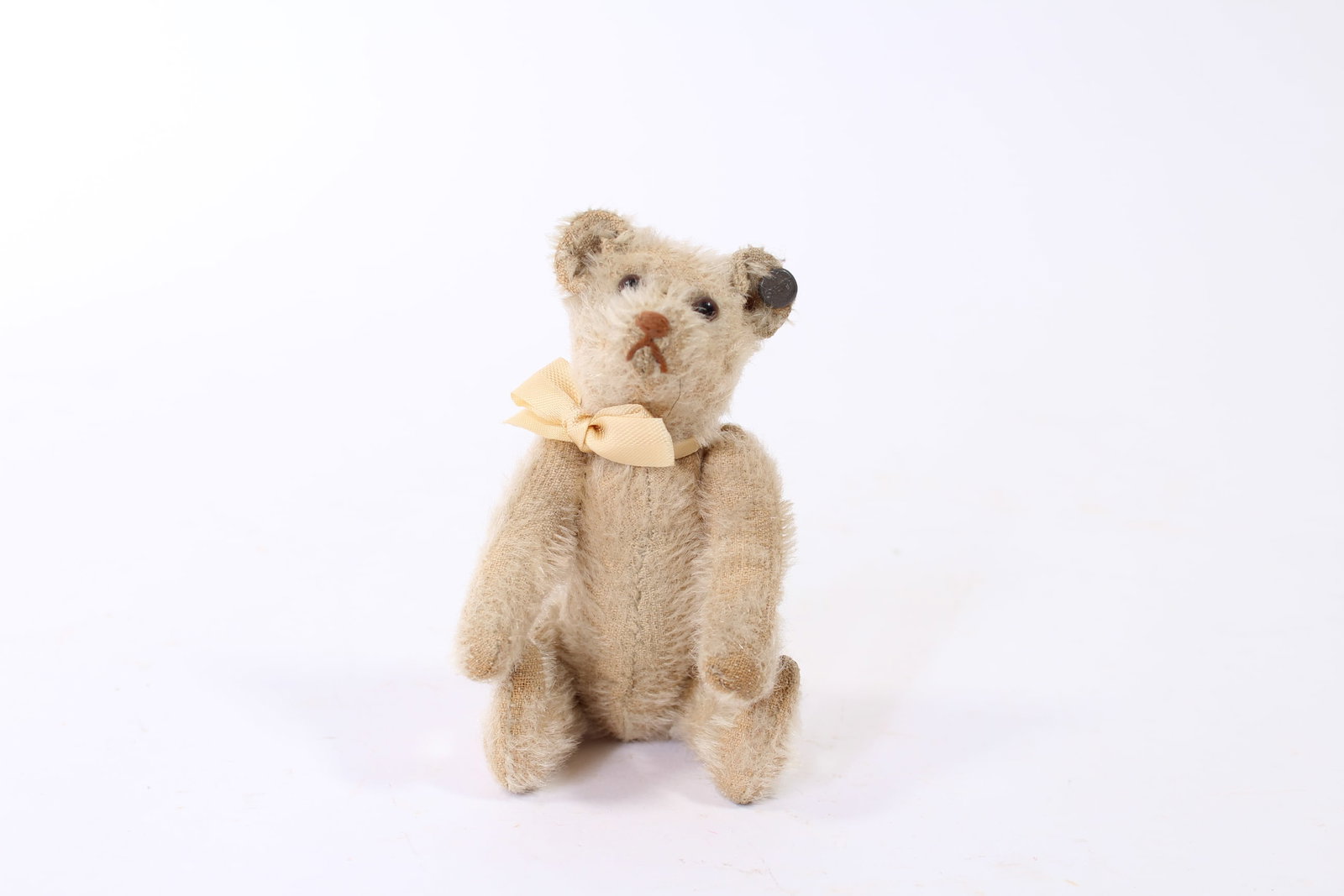 MINIATURE STEIFF RATTLE BEAR. (1 of 3)
