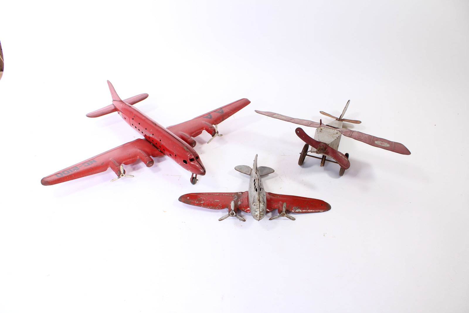 THREE PRESSED STEEL AIRPLANES, COMPRISING A MARX (NEW YORK, NEW YORK) FLAGSHIP AMERICAN AIRLINES (1 of 11)