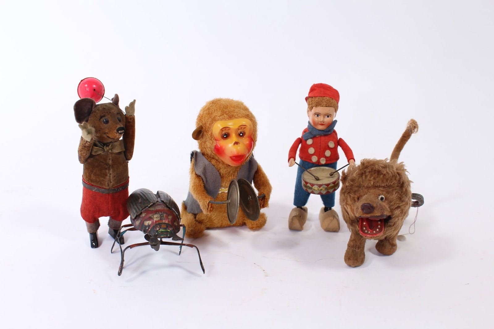 FIVE WIND-UP TOYS. (1 of 17)