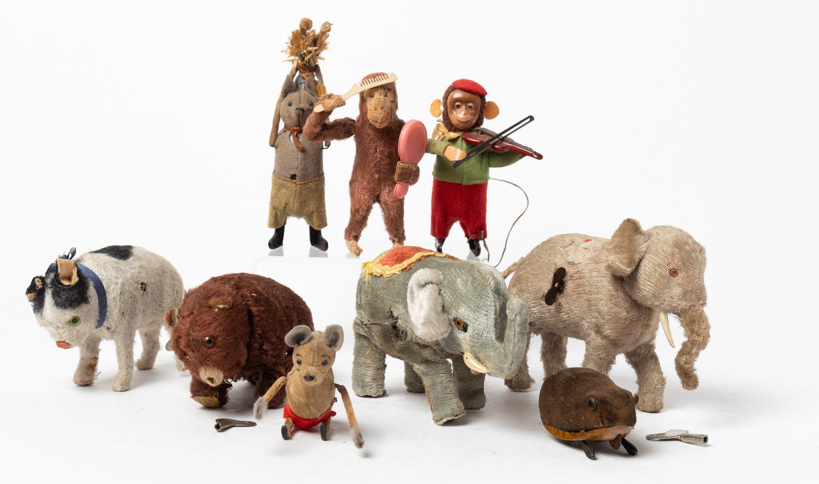NINE GERMAN AND JAPANESE PLUSH WINDUP ANIMALS. (1 of 6)