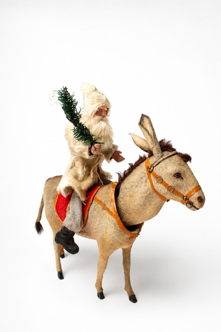 SANTA RIDING A NODDING DONKEY. (1 of 5)