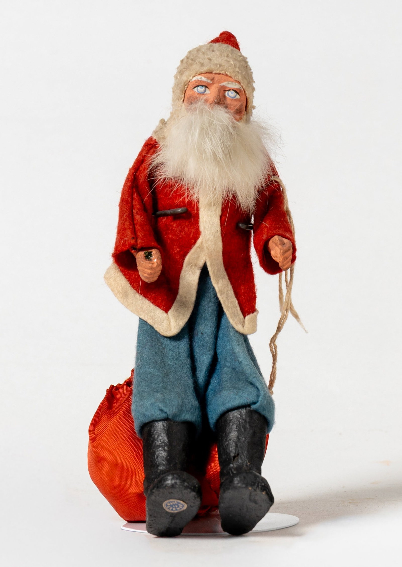 SANTA LEANING OVER HIS BAG FIGURE. (1 of 6)