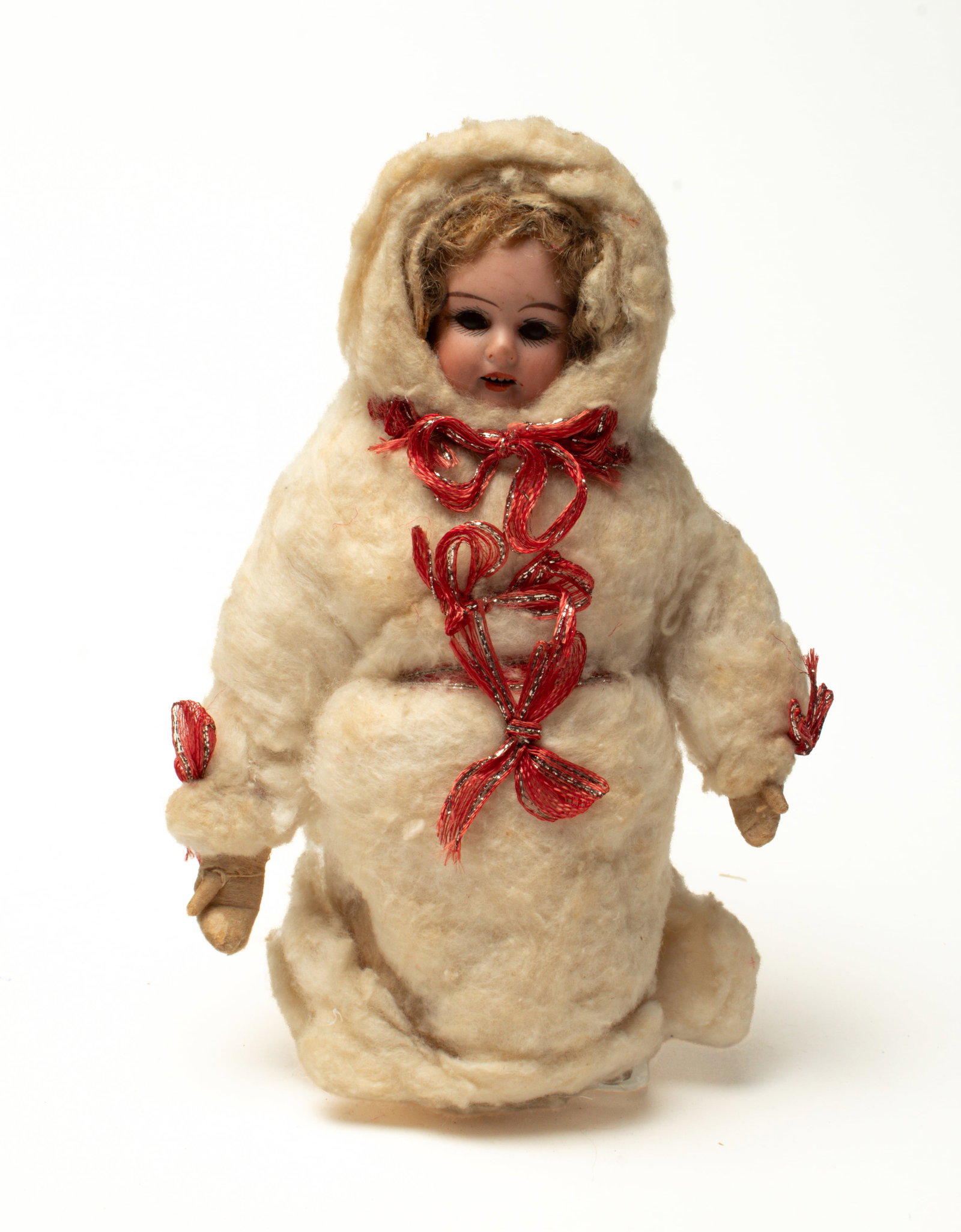 BISQUE HEAD DOLL WITH A COTTON COAT. (1 of 3)