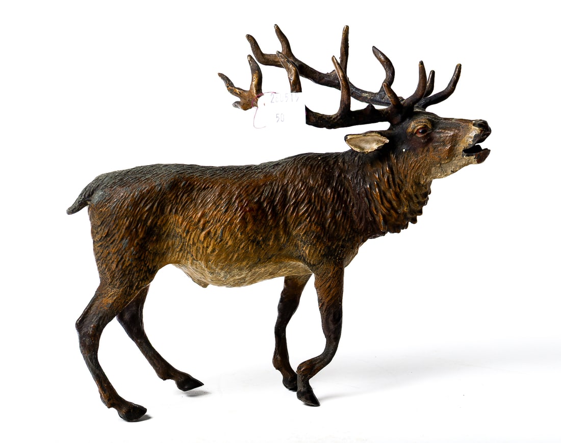 PAINTED BRONZE REINDEER.: PAINTED BRONZE REINDEER. Germany, early 20th Century. A free-standing reindeer with large antlers and an open mouth. 7.5"h. 8.5"l. Provenance: Nancy Goff (Alliance, Ohio).