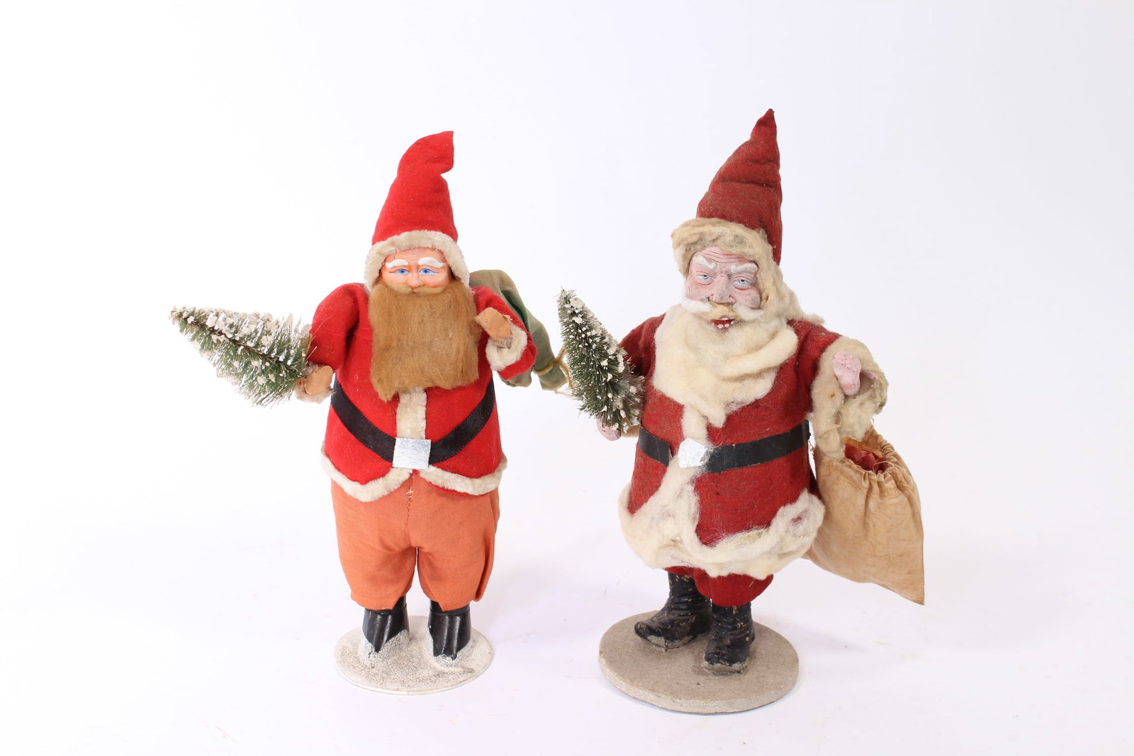 TWO STANDING SANTA FIGURES WITH BOTTLE BRUSH TREES. (1 of 5)