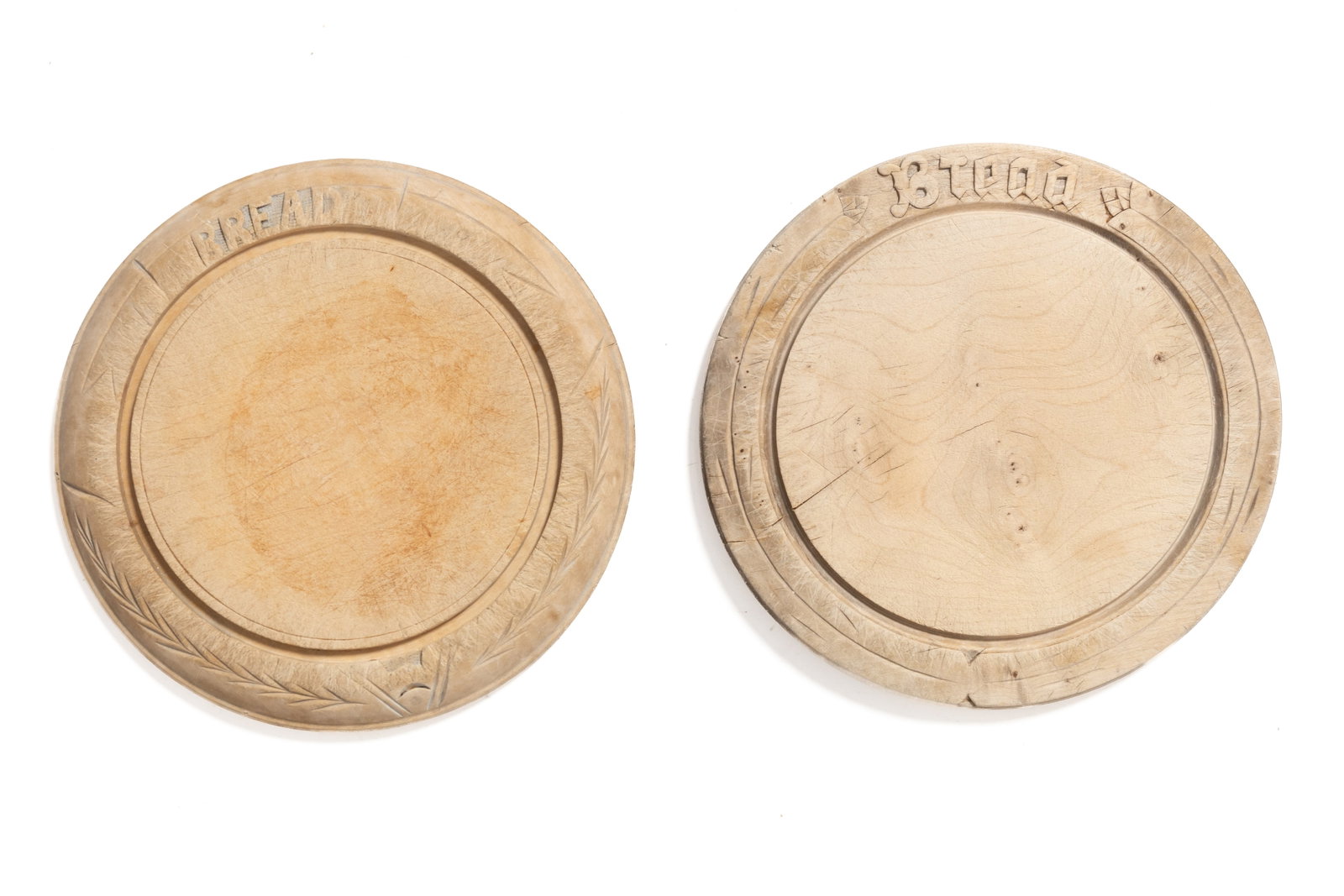 TWO CARVED BREAD PLATES. (1 of 2)