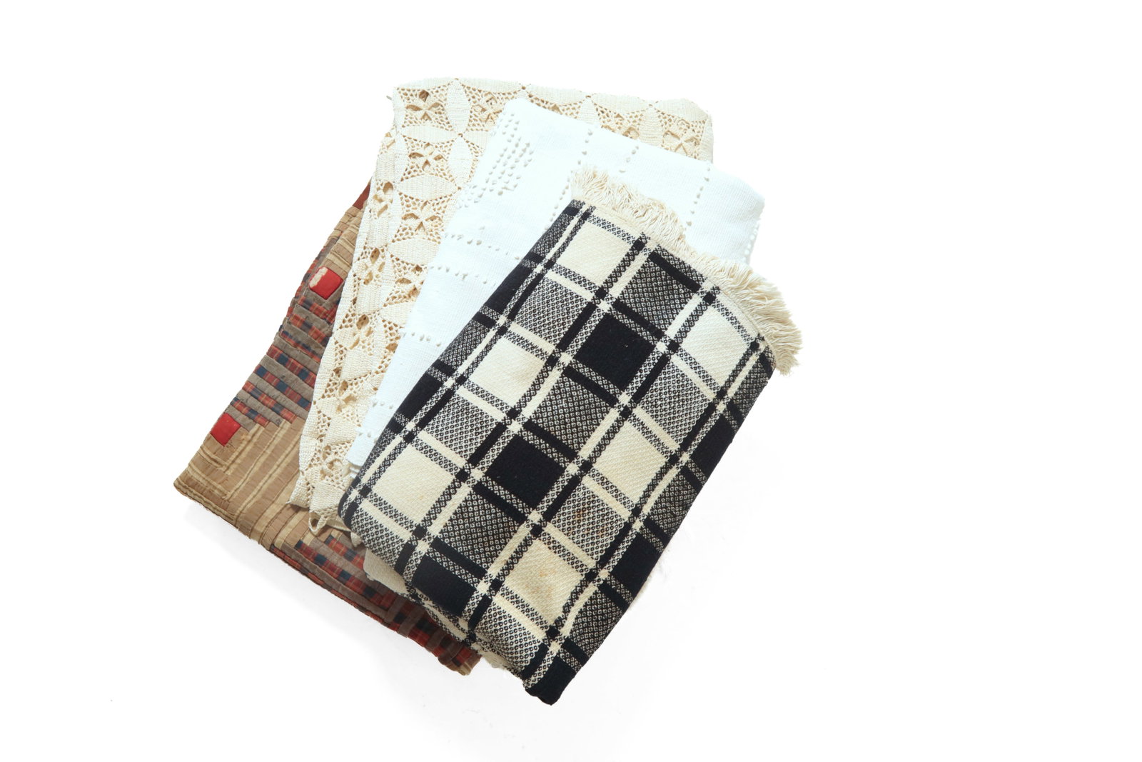 GROUP OF FOUR BED COVERINGS.: GROUP OF FOUR BED COVERINGS. American. Comprising a 19th-century wool, linen, and cotton Log Cabin pattern quilt, 62"w. 84"l; a 20th-century blue and cream plaid cotton coverlet in two sections, with