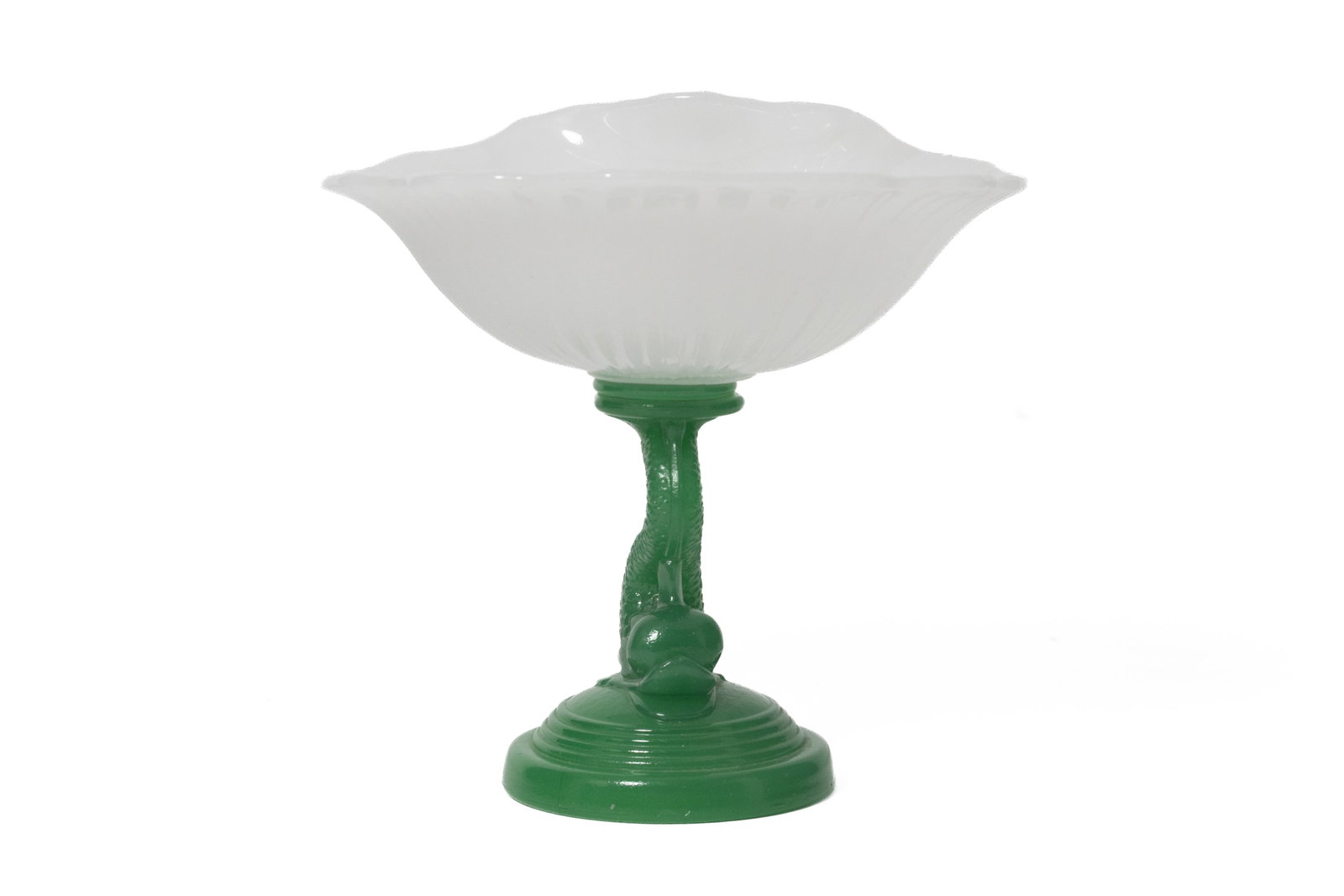 BOSTON AND SANDWICH GLASS COMPANY TAZZA WITH DOLPHIN BASE.: BOSTON AND SANDWICH GLASS COMPANY TAZZA WITH DOLPHIN BASE. American (Massachusetts), third quarter 19th century. Jade green base wafered to clam broth shell-shaped bowl. 6.25"h.