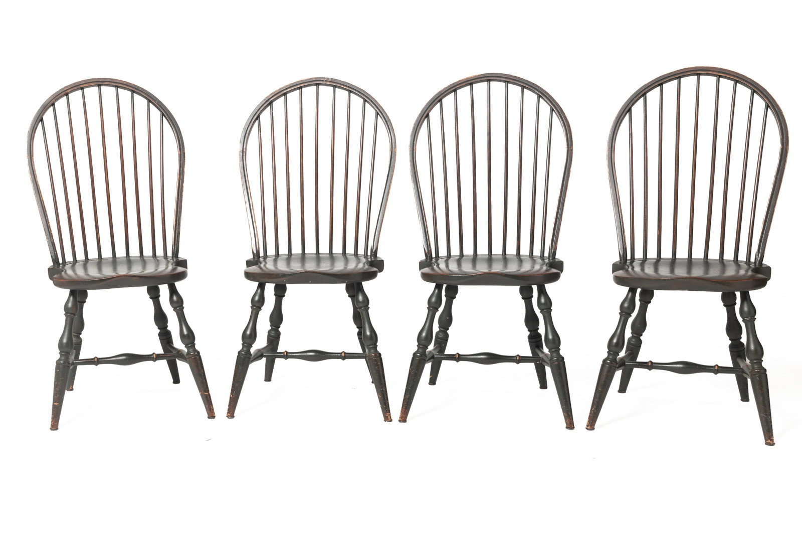 FOUR DAVID T. SMITH BOW-BACK WINDSOR SIDE CHAIRS.: FOUR DAVID T. SMITH BOW-BACK WINDSOR SIDE CHAIRS. American (Morrow, Ohio), late 20th Century. Mixed woods. Spindle backs, saddle seats, turned legs, and stretchers with distressed green paint. 17.5"