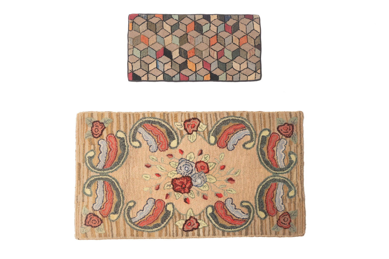 TWO HOOKED RUGS.: TWO HOOKED RUGS. American, early 20th Century. A large rectangular rug with a tan reserve filled with a bouquet of red flowers, a leafy border, and roses at the corners, 34.75"w. 60"l., together with