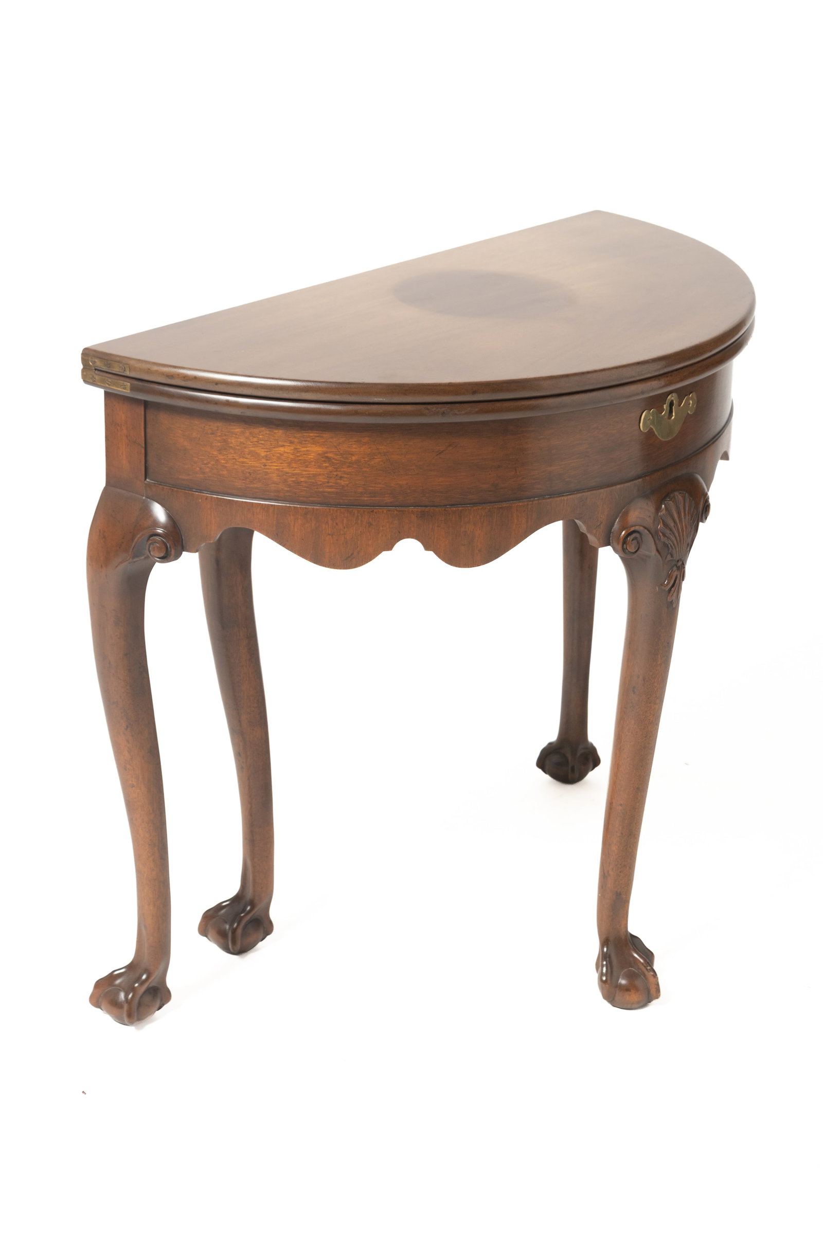 KITTINGER "COLONIAL WILLIAMSBURG" QUEEN ANNE STYLE DEMILUNE CARD TABLE.: KITTINGER "COLONIAL WILLIAMSBURG" QUEEN ANNE STYLE DEMILUNE CARD TABLE. American, second half 20th Century. Mahogany. Pattern number CW159, serial number L14. Bifold top, base with interior locking