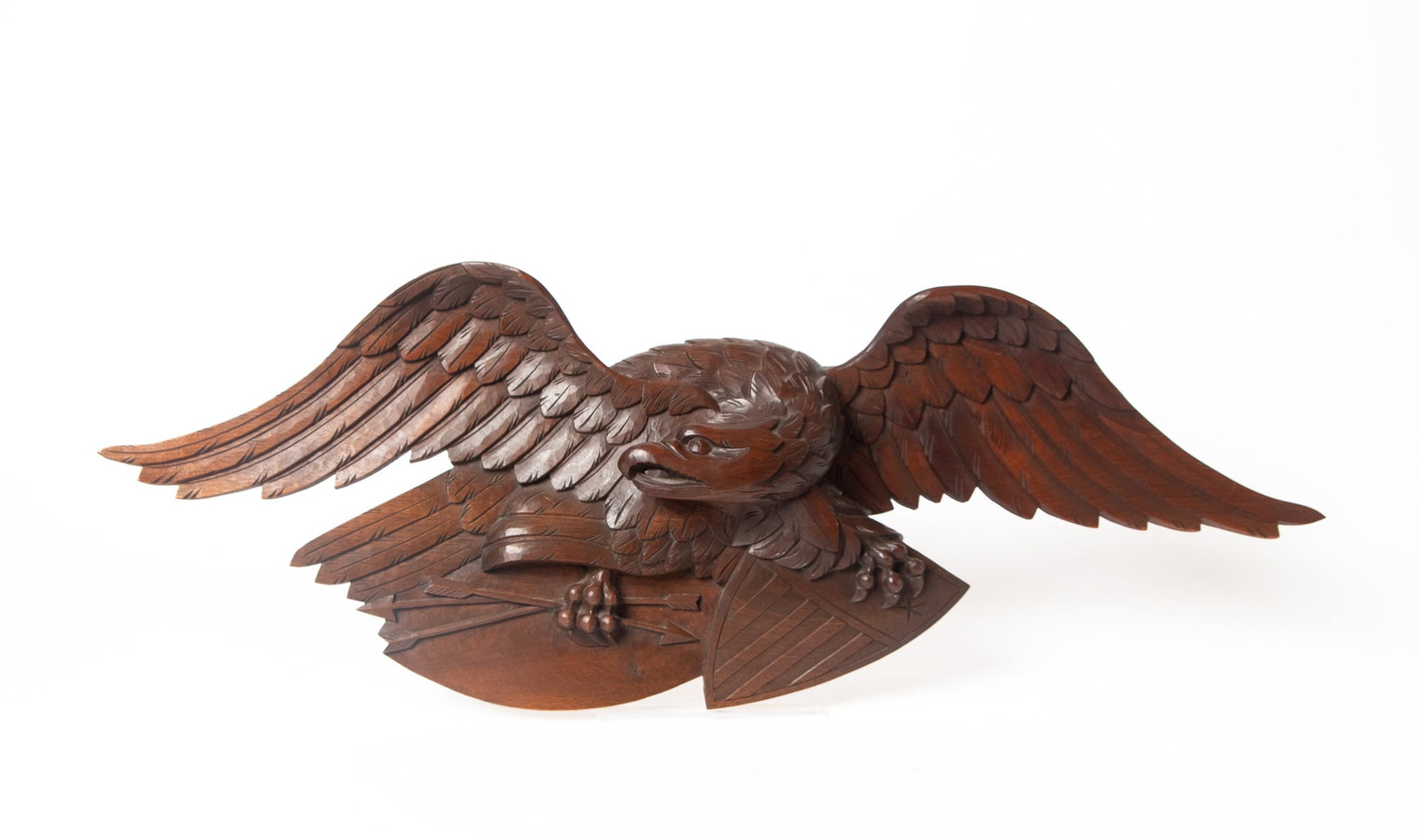 TWO CARVED SPREAD-WINGED EAGLES. - 2