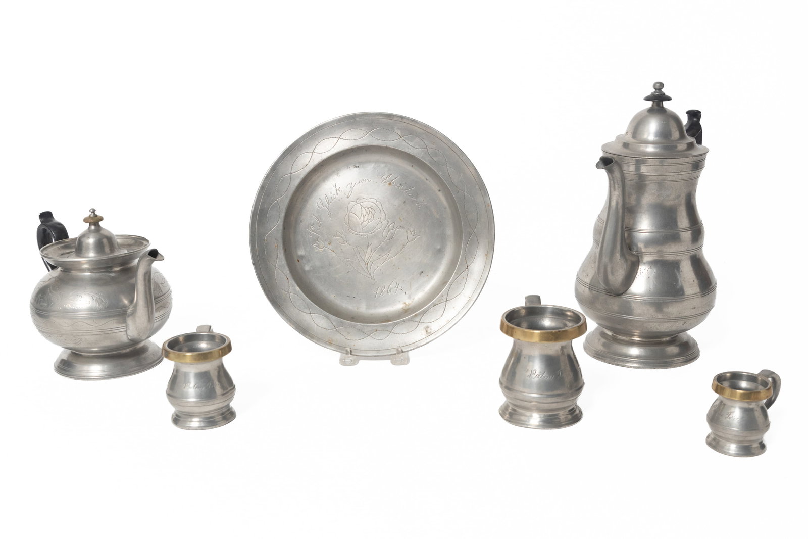 SIX PEWTER ITEMS.: SIX PEWTER ITEMS. Mid- 19th Century. Two American "Boardman & Company, New York" footed coffee pots. Both with shaped wooden handles painted black and goose neck spouts. Tall pot, 12"h. and squatty po