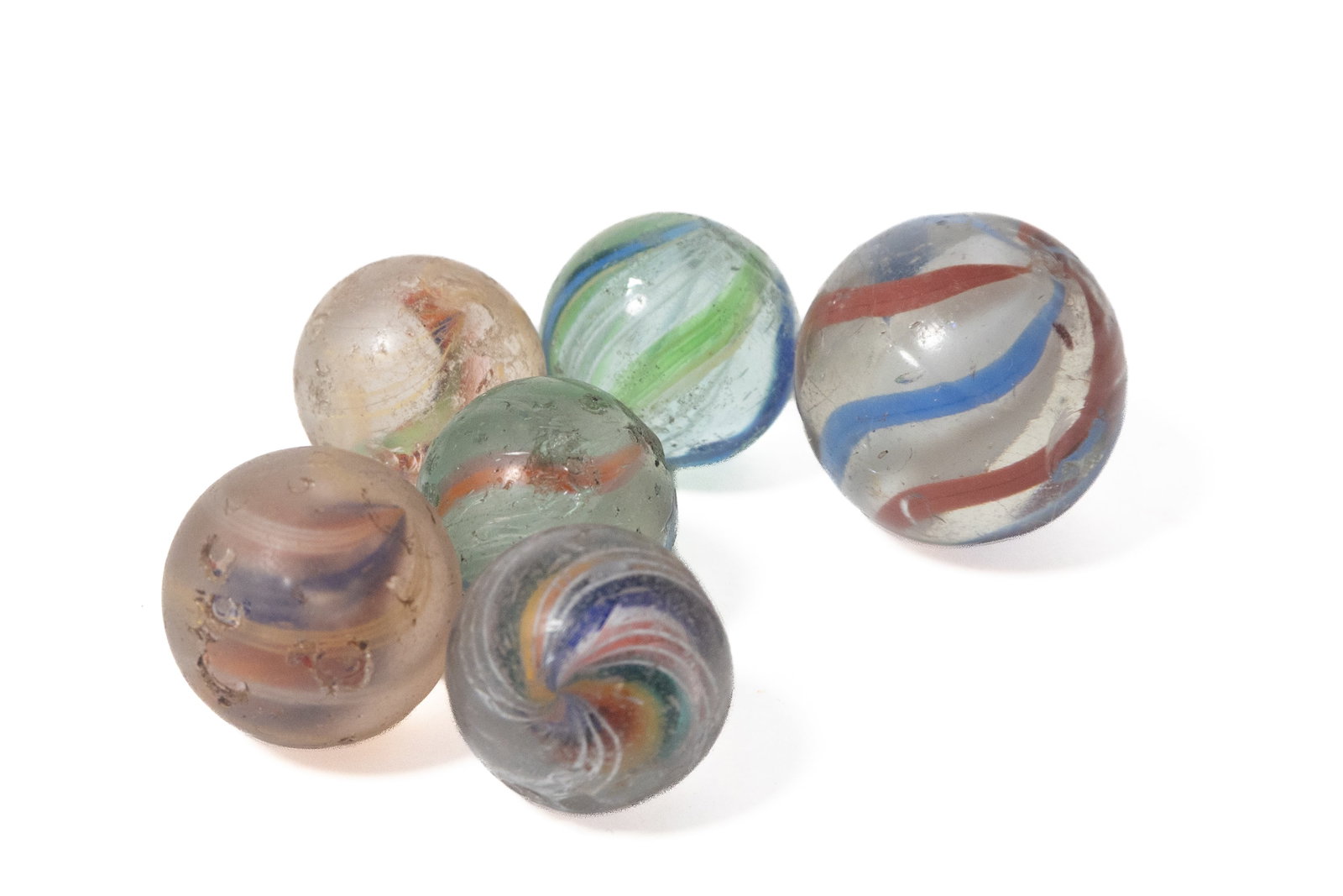 SIX LATTICINO OR RIBBON CORE SWIRL GLASS MARBLES. (1 of 2)