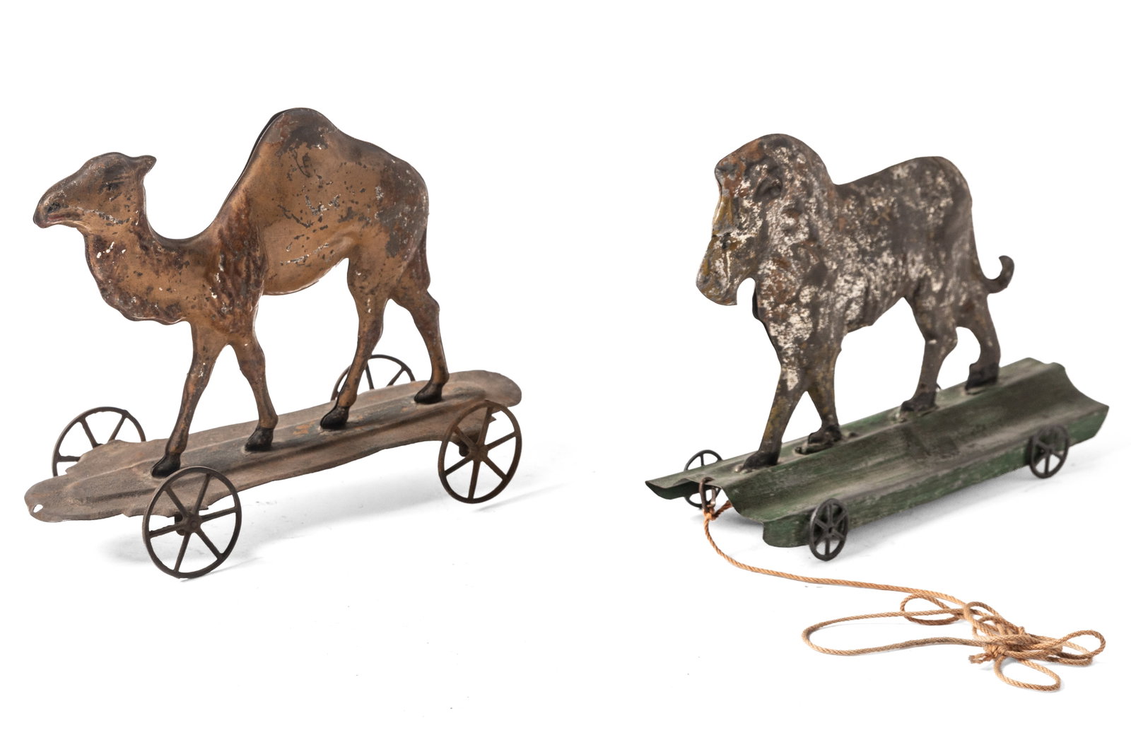 PRESSED AND PRINTED TIN CAMEL AND LION PULL TOYS.