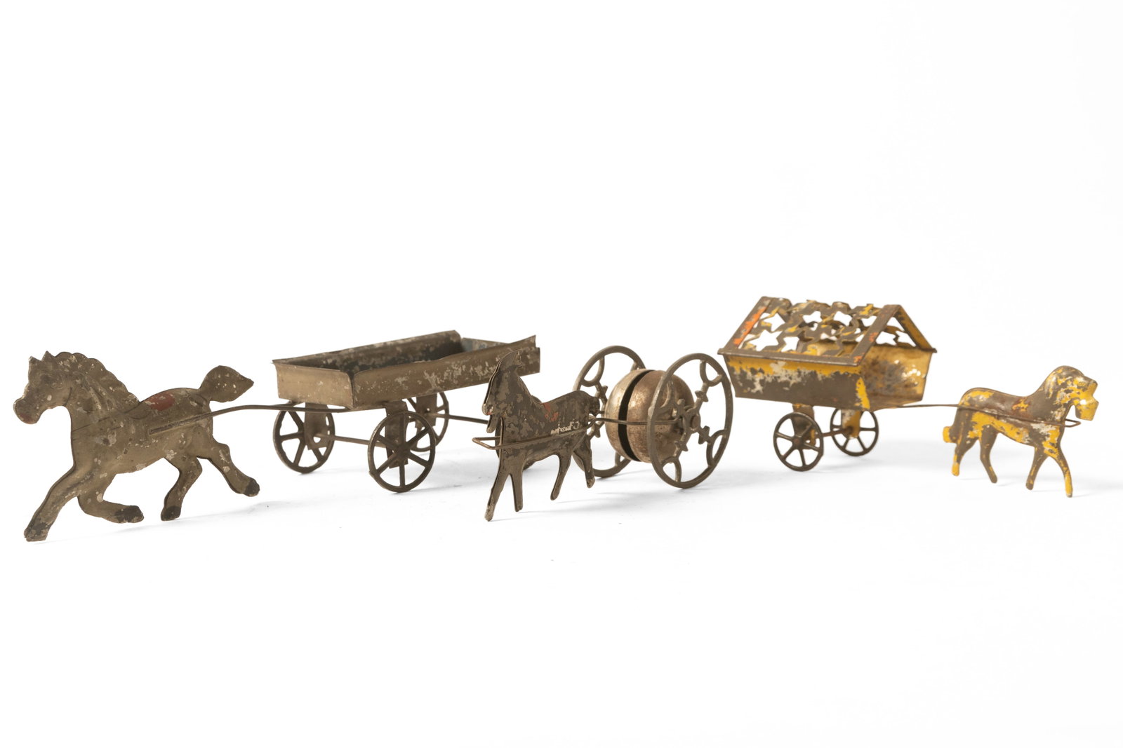 THREE PRESSED AND PRINTED TIN HORSE AND GOAT PULL TOYS. (1 of 16)