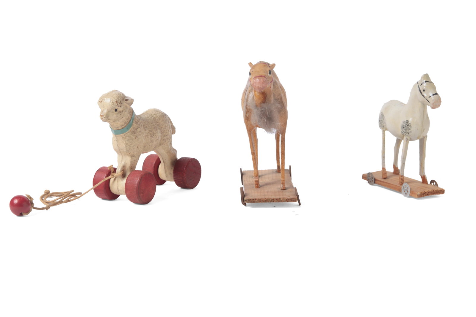 THREE ANIMAL PULL TOYS ON WHEELS. (1 of 20)