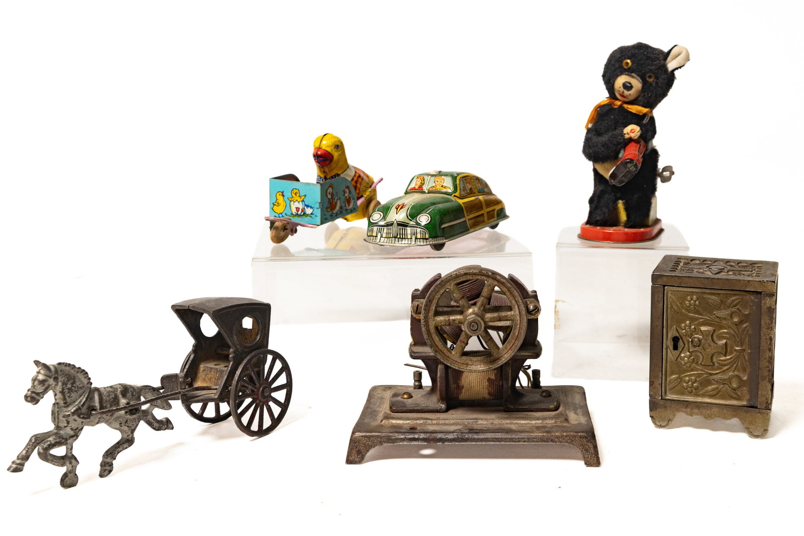 THREE TIN LITHO WIND-UP AND THREE CAST IRON TOYS. (1 of 20)