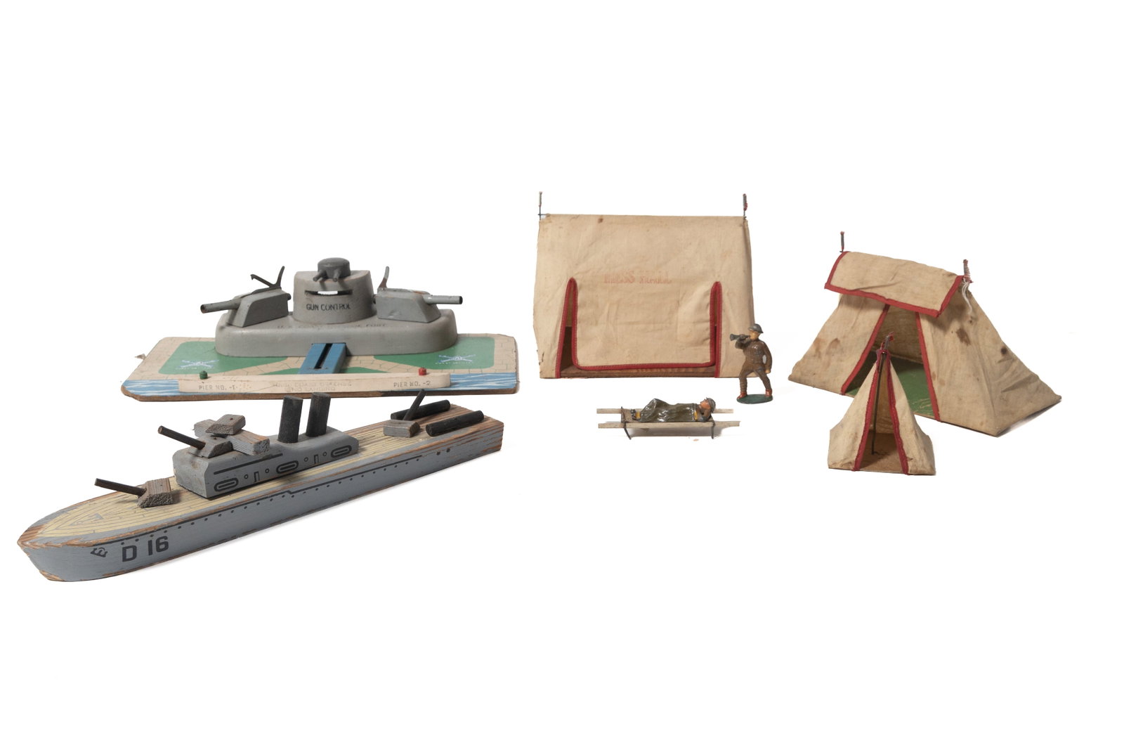KEYSTONE (BOSTON, MASSACHUSETTS) U.S. COAST DEFENSE FORT AND PATROL SHIP.: KEYSTONE (BOSTON, MASSACHUSETTS) U.S. COAST DEFENSE FORT AND PATROL SHIP. American, 20th Century. Painted wood on particle board fort with defense guns, marked; a painted wood ship; plus three fabric 