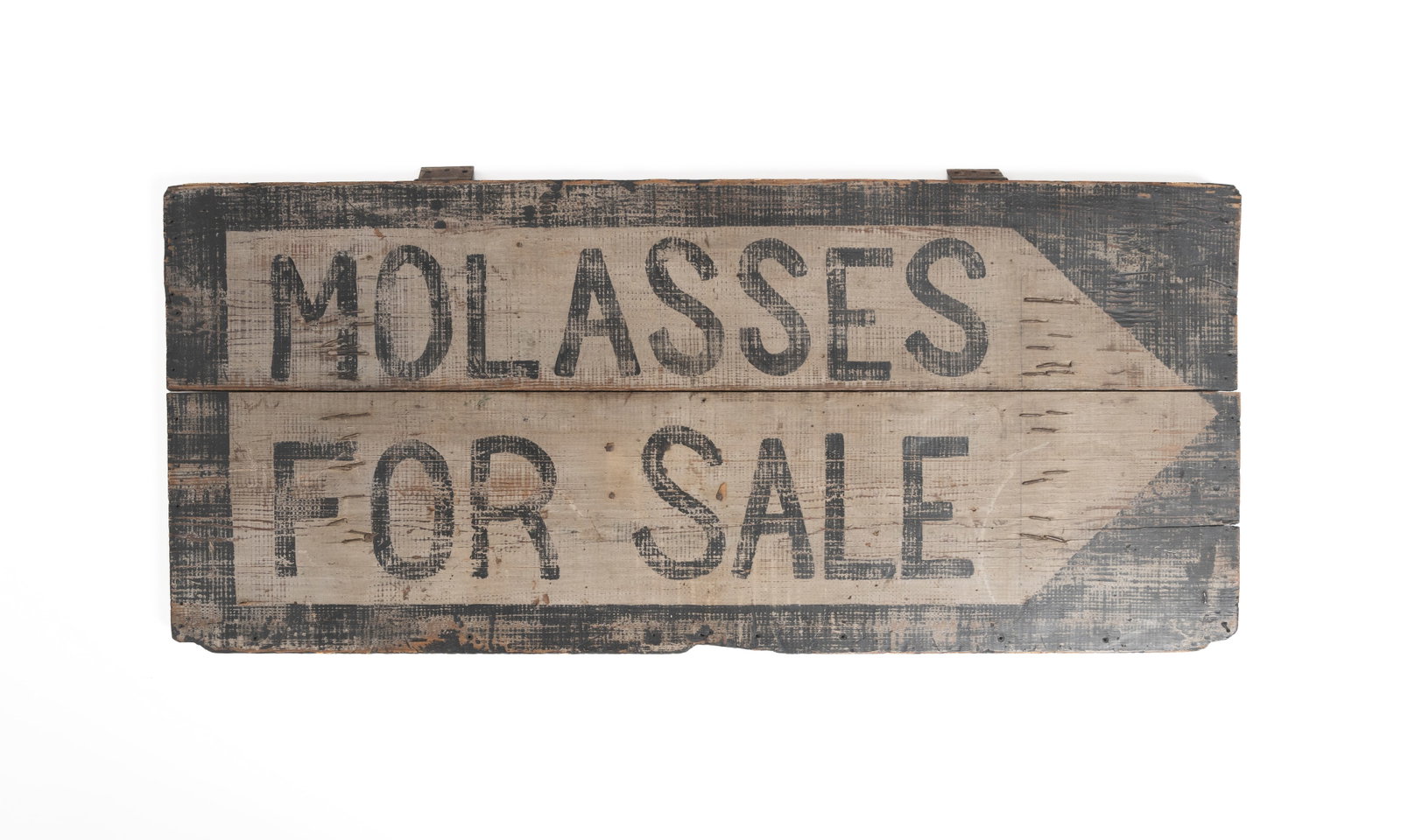 HAND-PAINTED "MOLASSES FOR SALE" SIGN.: HAND-PAINTED "MOLASSES FOR SALE" SIGN. American, 20th Century. Painted on a pine door with battens, having black lettering on a white arrow on a black ground. 21"h. 48"w.