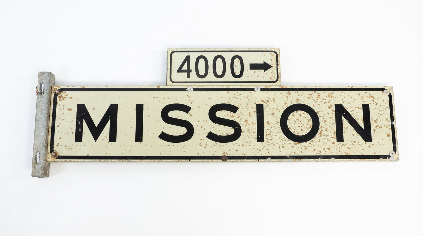 DOUBLE-SIDED "MISSION" STREET SIGN.: DOUBLE-SIDED "MISSION" STREET SIGN. American, 20th Century. Aluminum double-sided "MISSION" and "4000" on an iron pole bracket. Provenance: From the late George Shahady (Bridgeport, West Virginia).