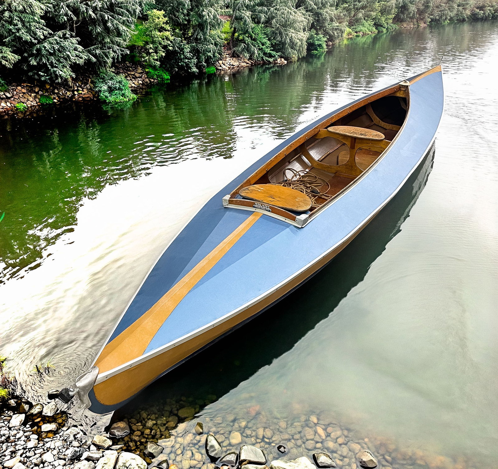 FOLBOT CAREFREE TRAVEL CRAFT KAYAK.: FOLBOT CAREFREE TRAVEL CRAFT KAYAK. American (Charleston, South Carolina), second half 20th Century. Laminated frame, two-seat opening, blue and tan vinyl covering, and aluminum trim. 15"h. 39"w. 210"
