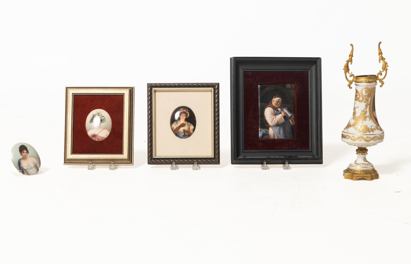 FIVE ARTIST SIGNED PAINTED PORCELAIN ITEMS.: FIVE ARTIST SIGNED PAINTED PORCELAIN ITEMS. German, second half 19th Century. Four are signed Wagner: a vase with Ormolu mounts, floral gold trim on oval reserve of a lady in red dress, lace collar, a
