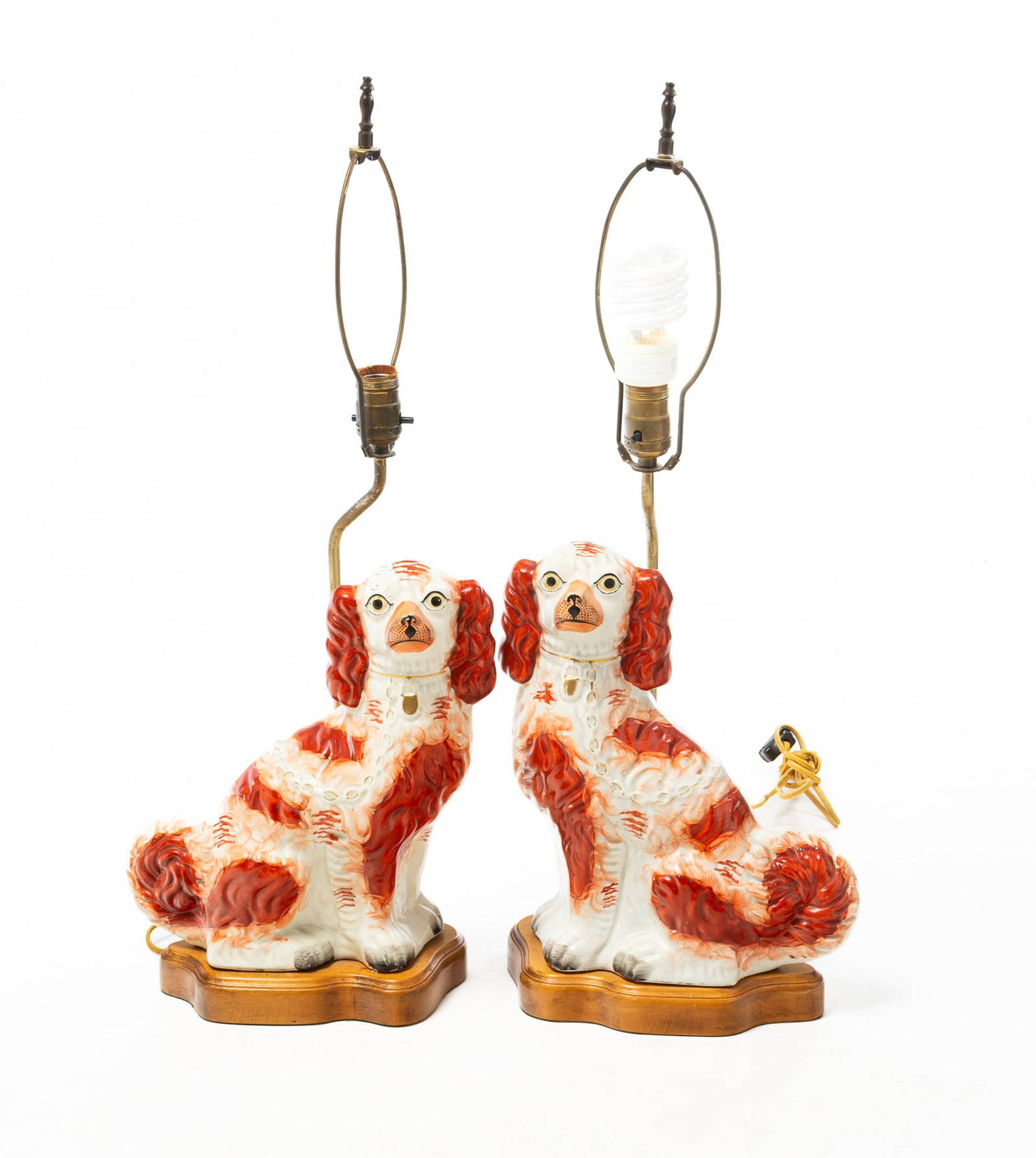 TWO STAFFORDSHIRE SEATED SPANIEL TABLE LAMPS. (1 of 5)