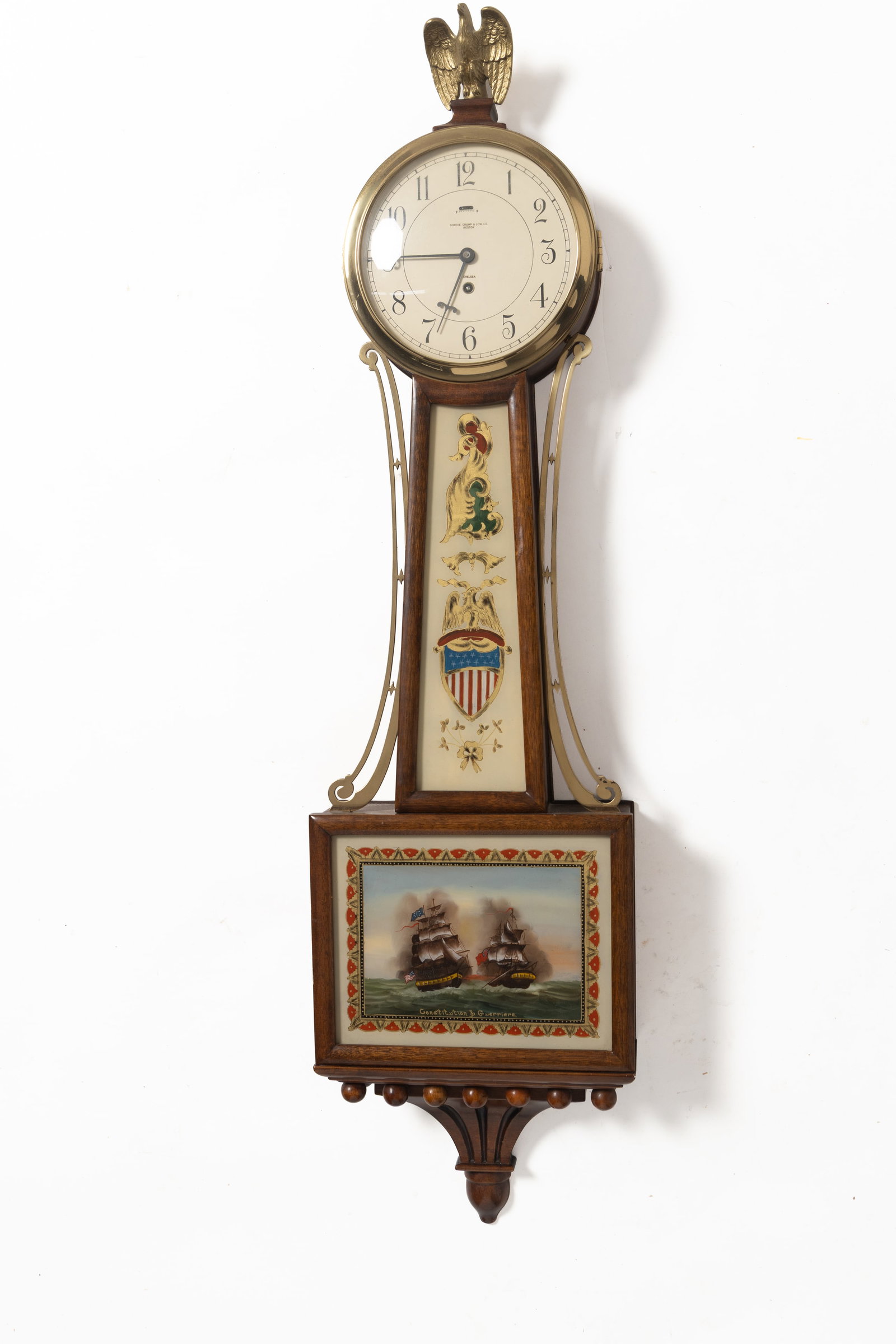 SHREVE, CRUMP, AND LOW CO. MAHOGANY BANJO CLOCK WITH REVERSE PAINTED TABLET AND EAGLE FINIAL. (1 of 9)