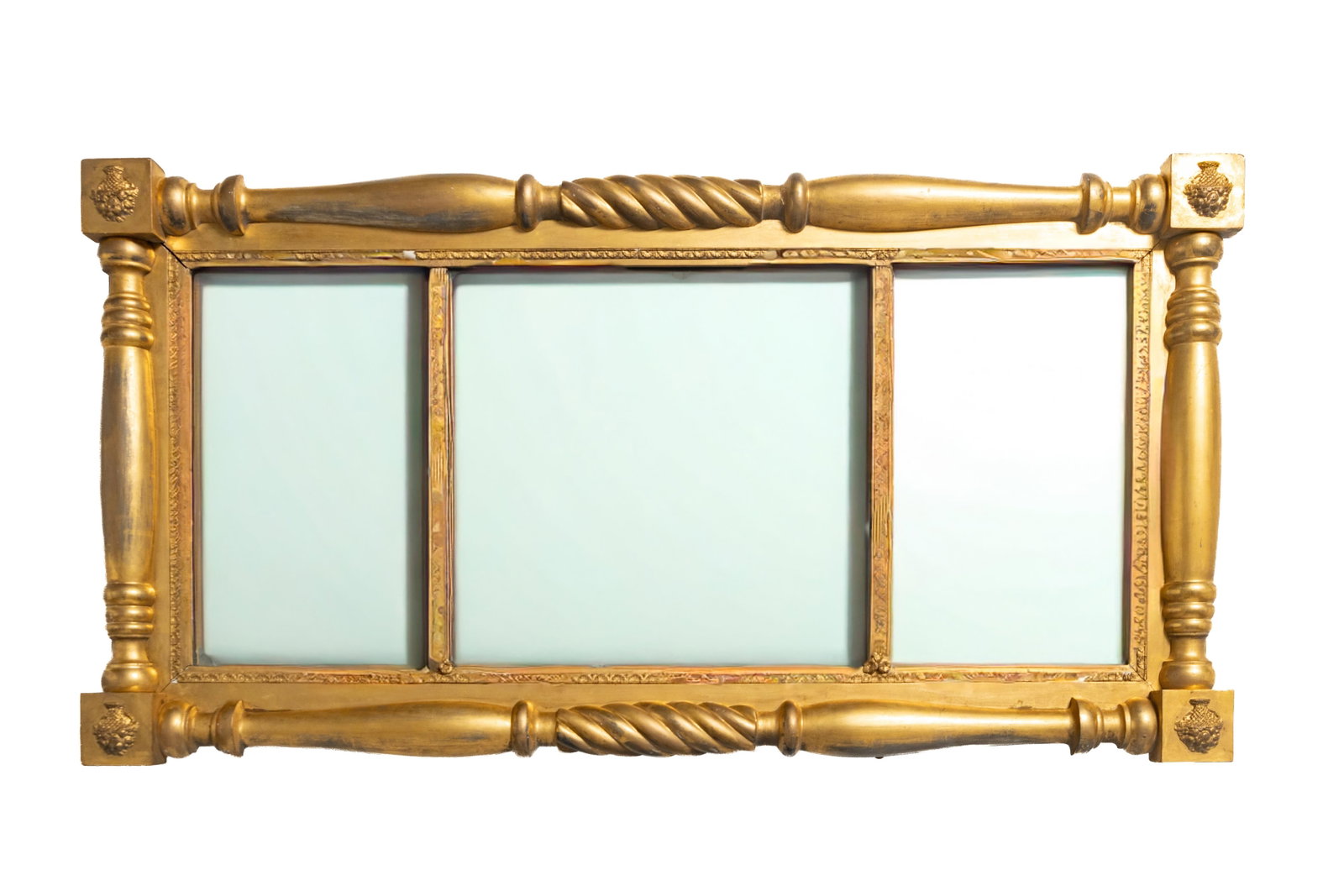 EMPIRE GILT OVERMANTEL MIRROR.: EMPIRE GILT OVERMANTEL MIRROR. American, 19th Century. Corner blocks with flowers, turned pilasters with flower bouquet decoration, and three mirrored sections. 29.25"h.