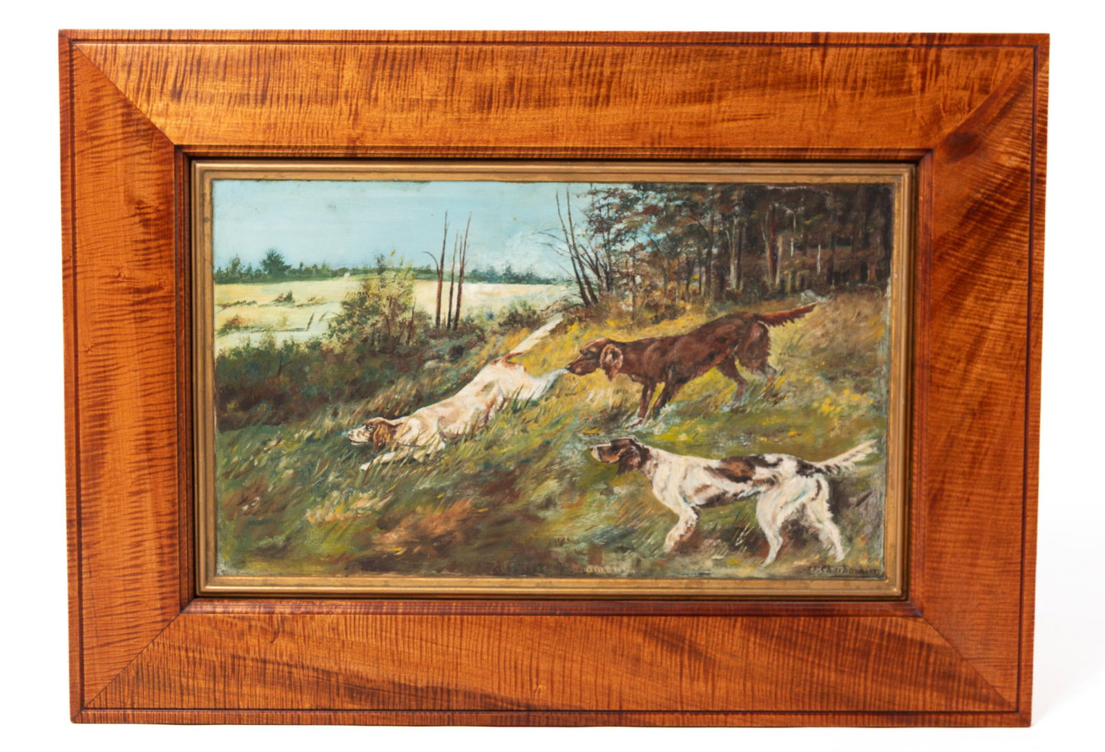 J.F. CHARBONNIER OIL ON TIN OF HUNTING DOGS ON POINT.: J.F. CHARBONNIER OIL ON TIN OF HUNTING DOGS ON POINT. Early 20th Century. Three pointers in high grass with a forest and lake in the background. 16"h. 26"w. In a tiger maple frame, 25"h. 35"w.