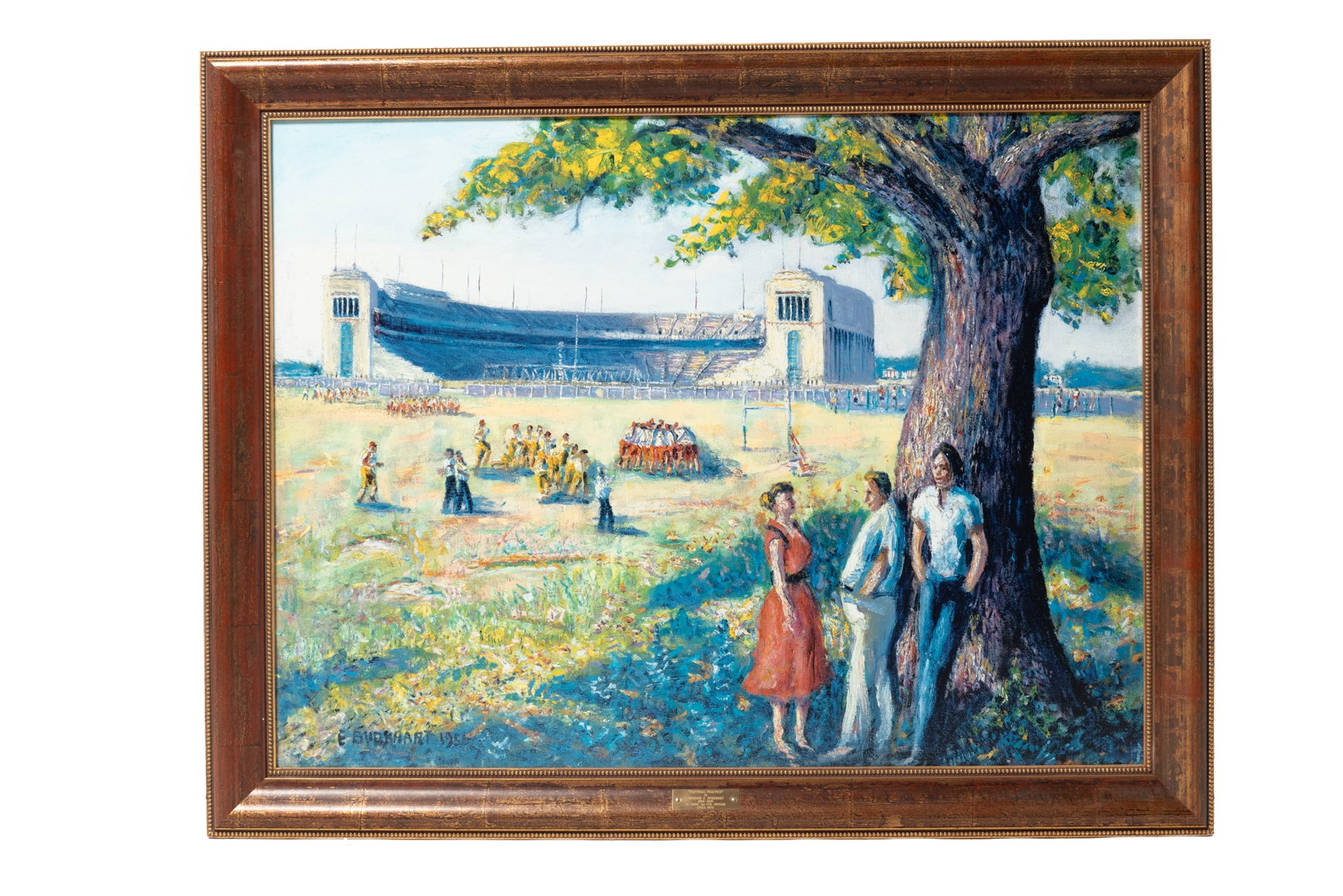 EMERSON BURKHART (OHIO, 1905 - 1969) "FOOTBALL PRACTICE" LIMITED EDITION GICLEE ON CANVAS.: EMERSON BURKHART (OHIO, 1905 - 1969) "FOOTBALL PRACTICE" LIMITED EDITION GICLEE ON CANVAS. 20th Century. Numbered 37/1000. A giclee reproduction of the painting showing three people near a tree