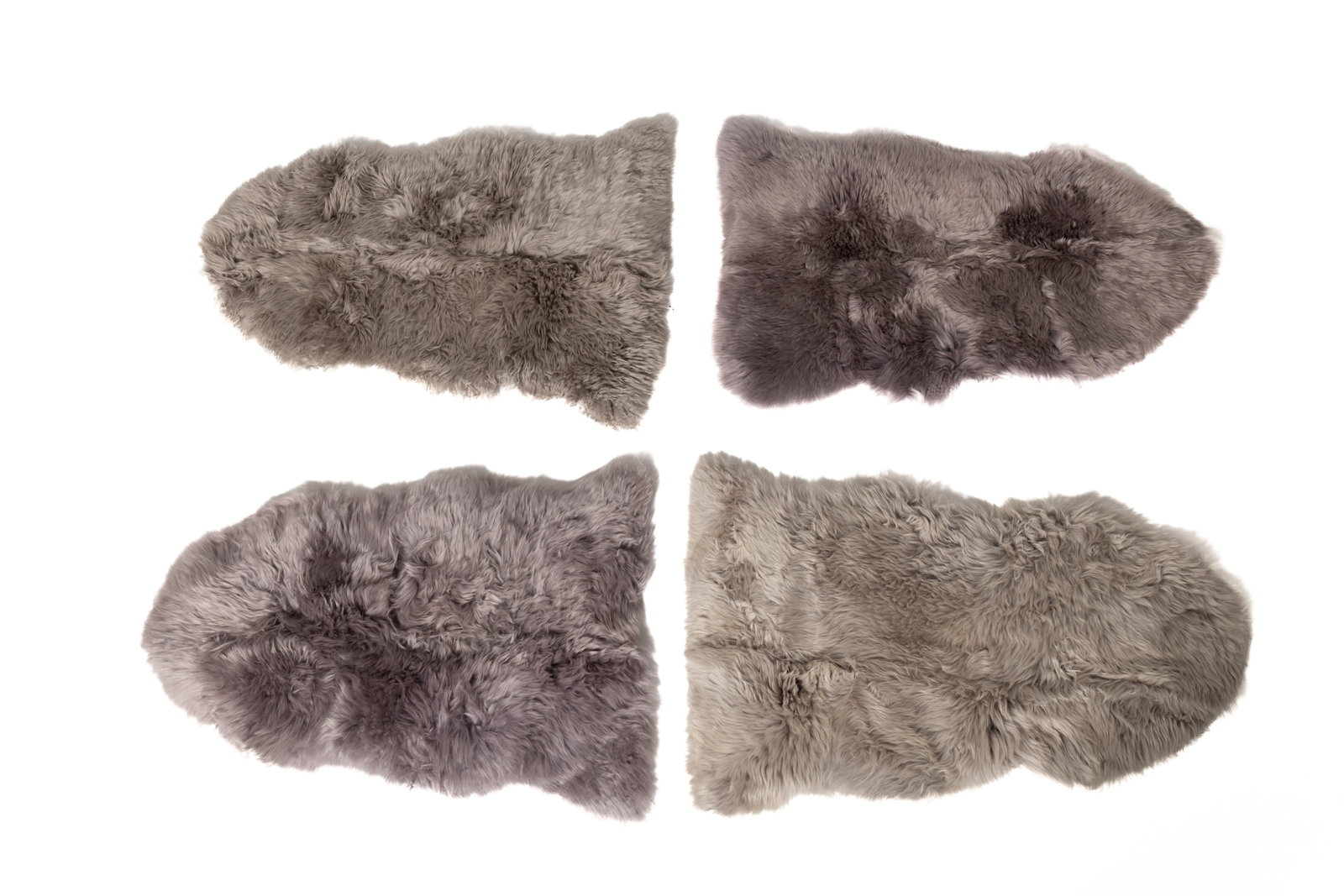 FOUR AUSTRALIAN AND NEW ZEALAND NATURAL SHEEPSKIN RUGS. (1 of 3)