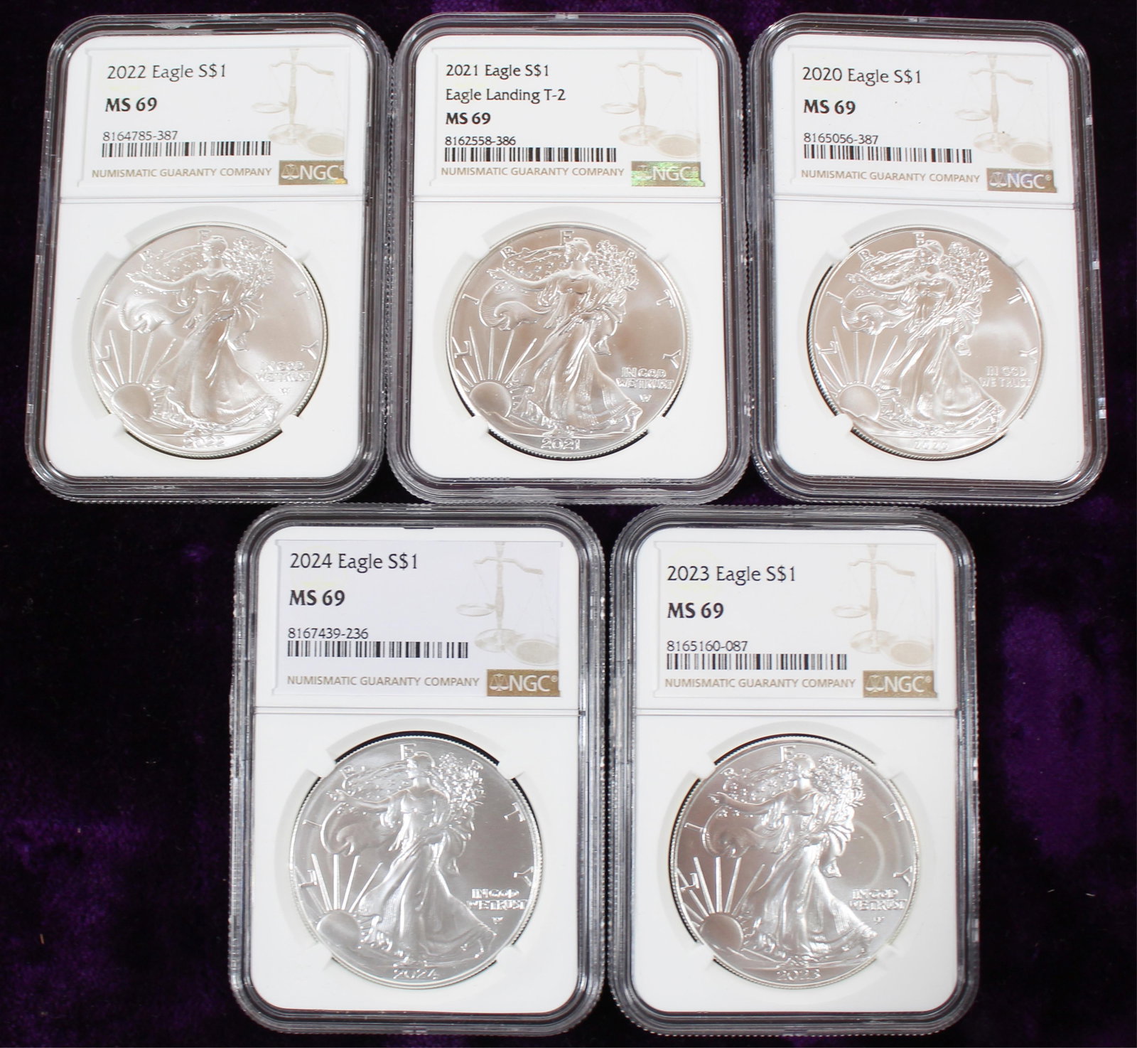 GROUP OF 5 U.S. SILVER EAGLE COINS MS69 2020-2024.: GROUP OF 5 U.S. SILVER EAGLE COINS MS69 2020-2024. U.S. silver eagle NGC graded MS69, 5 coins 2020-2024. *We do not grade or qualify coin condition, nor do we weigh currency that is indicated &