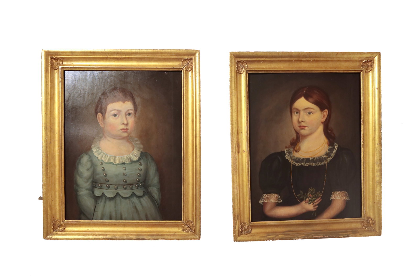 PAIR OF AMERICAN SCHOOL PORTRAITS.: PAIR OF AMERICAN SCHOOL PORTRAITS. Second quarter 19th Century. Oil on wood panel. A brother and sister. He has short auburn hair and gray eyes and wears a double-breasted light blue frock with lace