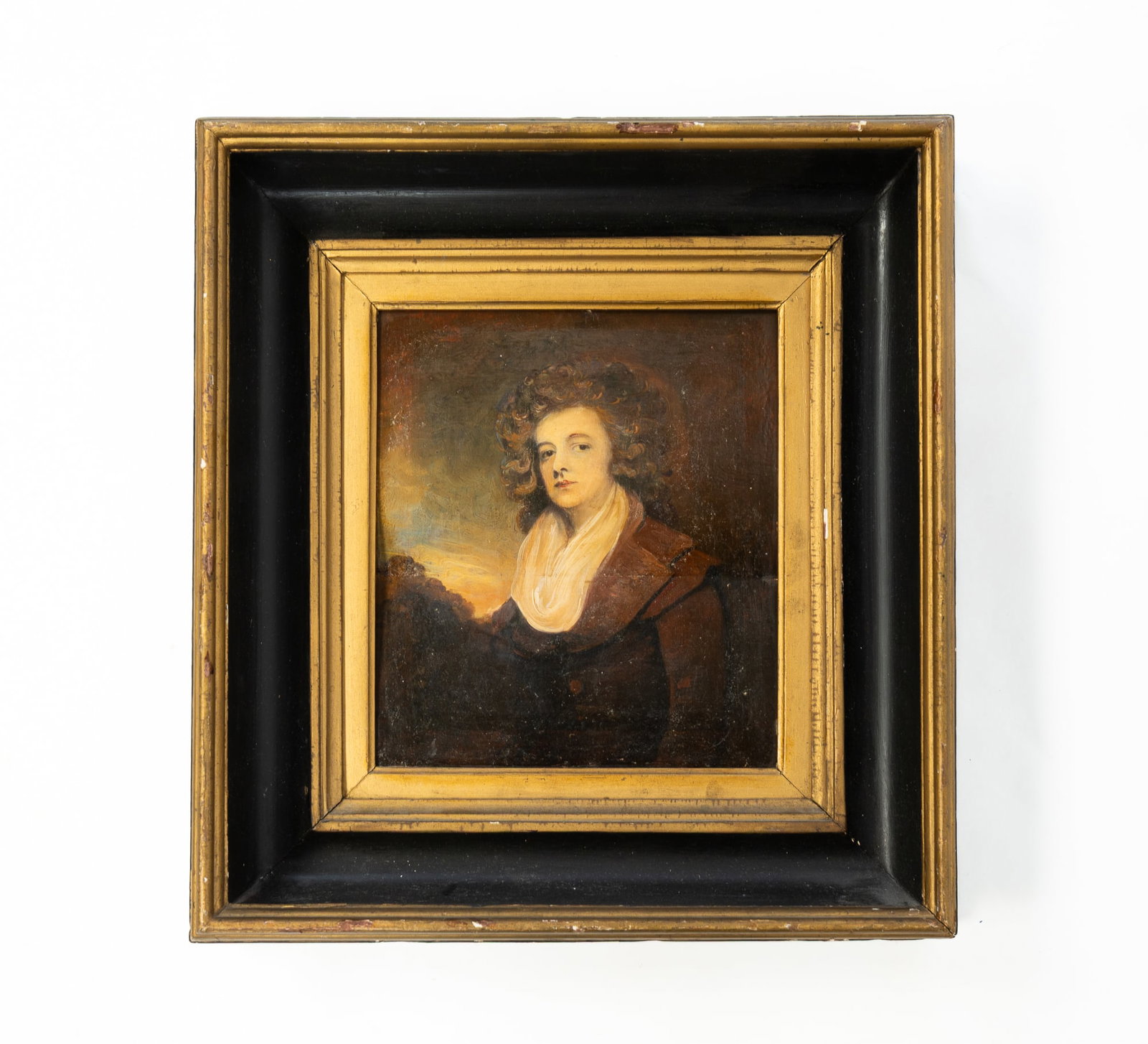 ATTRIBUTED TO GEORGE ROMNEY (ENGLISH, 1734-1802) "WIFE OF CAPTAIN JOHN ALBERT BENTINCK" OIL: ATTRIBUTED TO GEORGE ROMNEY (ENGLISH, 1734-1802) "WIFE OF CAPTAIN JOHN ALBERT BENTINCK" OIL PAINTING. Late 18th Century. Oil on canvas backed on board. Portrait of Mrs. Bentinck with curly hair, a