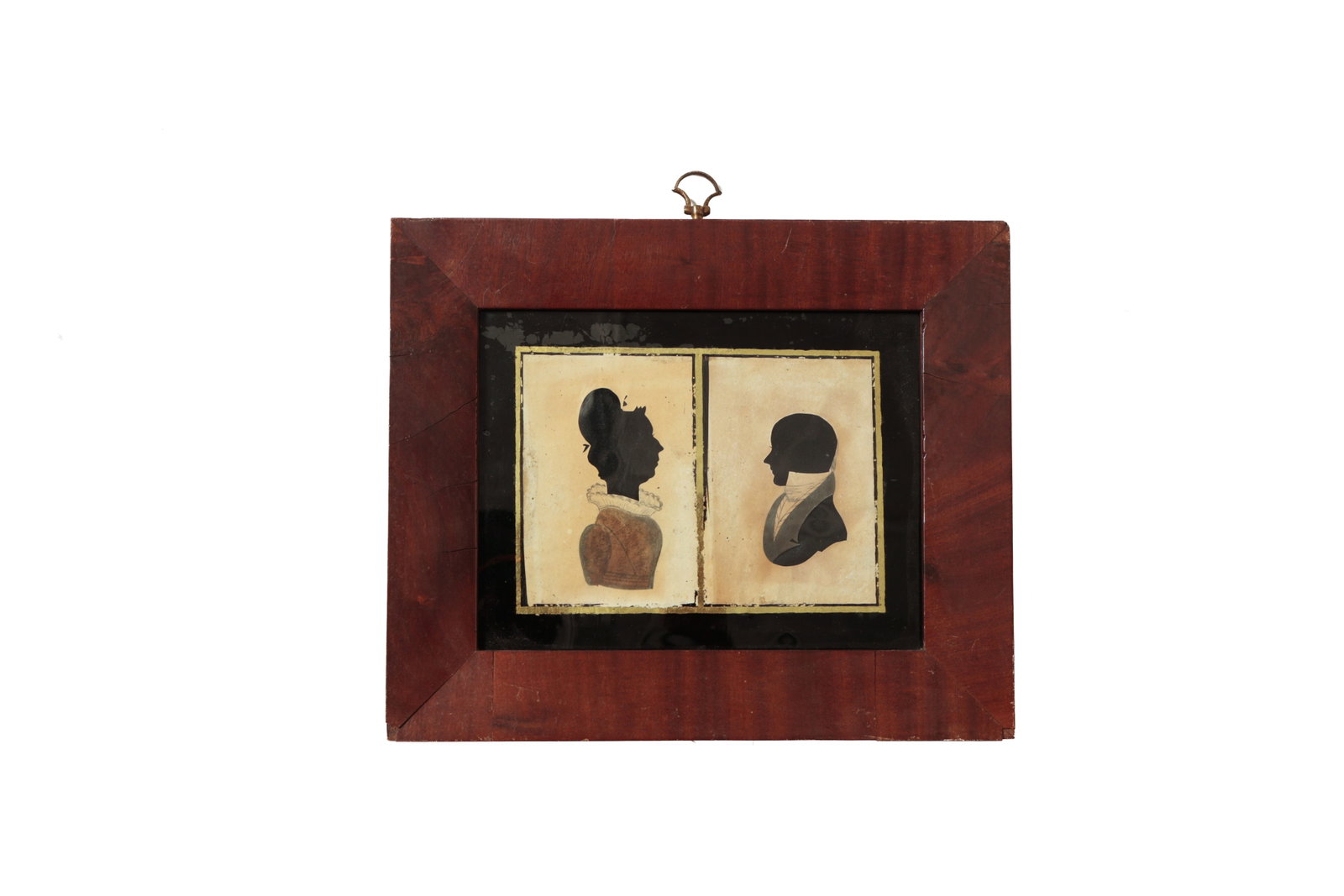 HUSBAND AND WIFE HOLLOW CUT SILHOUETTES.: HUSBAND AND WIFE HOLLOW CUT SILHOUETTES. American, 19th Century. Husband and wife hollow-cut silhouettes with ink and watercolor accents, an eglomise glass, and a veneered frame. Sight, 5.75âS