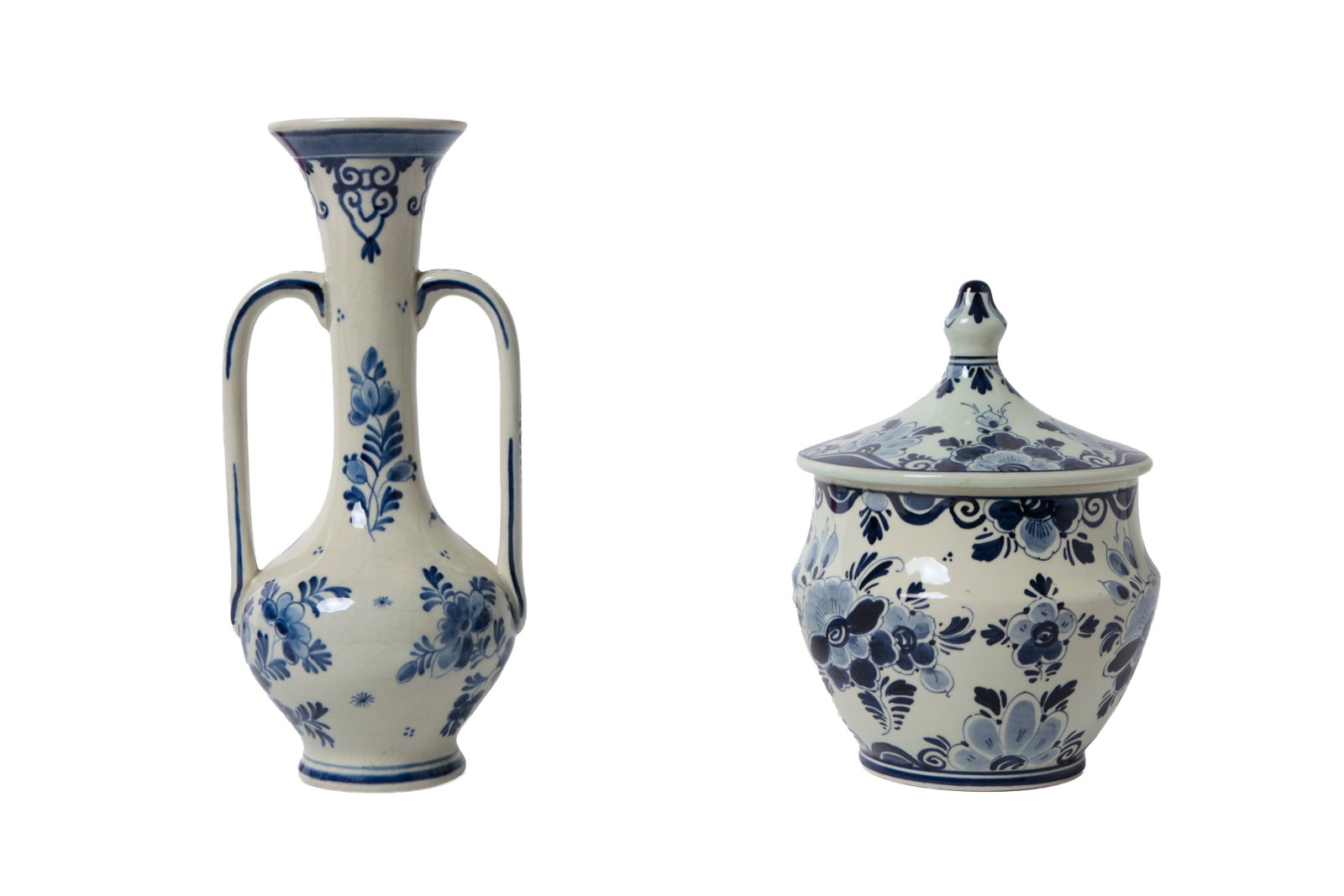 DELFT VASE AND LIDDED JAR.: DELFT VASE AND LIDDED JAR. Dutch, late 19th or early 20th Century. A tall double-handled vase in traditional cobalt Delft decoration, signed to bottom, 8.5"h. Together with a Delfts-Blauw bulbous