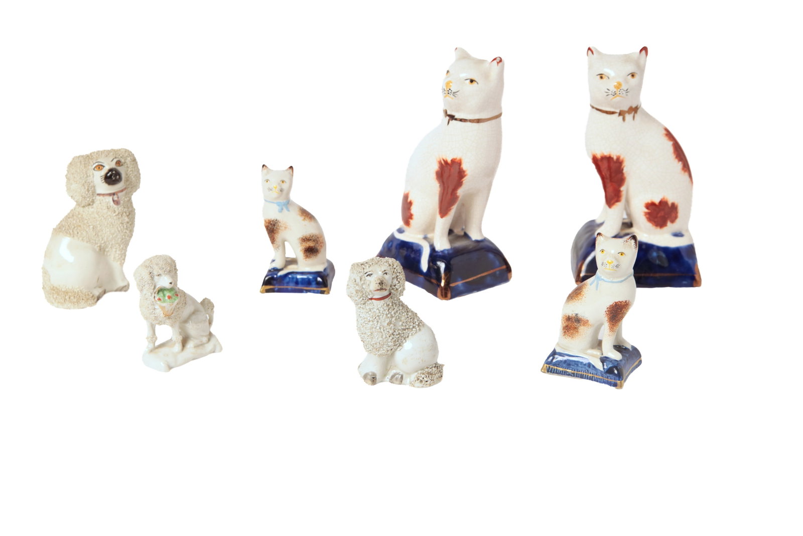 GROUP OF SEVEN STAFFORDSHIRE DOG AND CAT FIGURINES. (1 of 12)