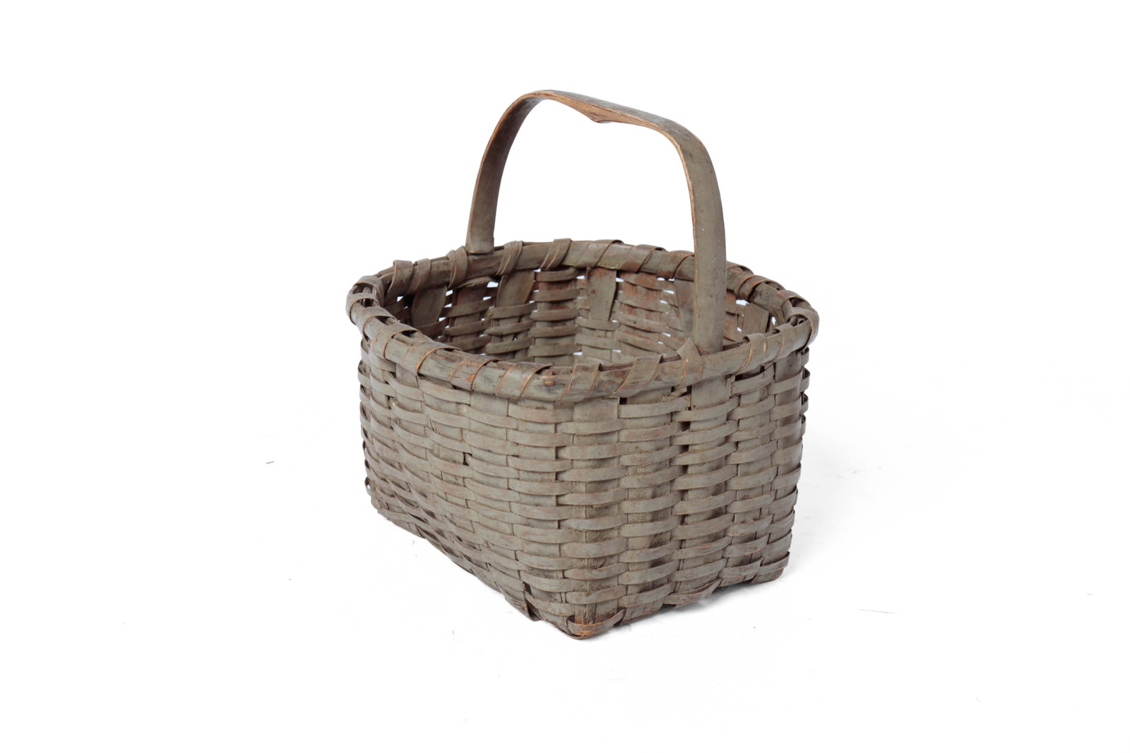 SQUARE WOVEN SPLINT BASKET IN ORIGINAL GREY PAINT.: SQUARE WOVEN SPLINT BASKET IN ORIGINAL GREY PAINT. American, 19th or early 20th Century. Square basket with tightly woven splints, wrapped rim, large splints at bottom, bentwood handle, and in