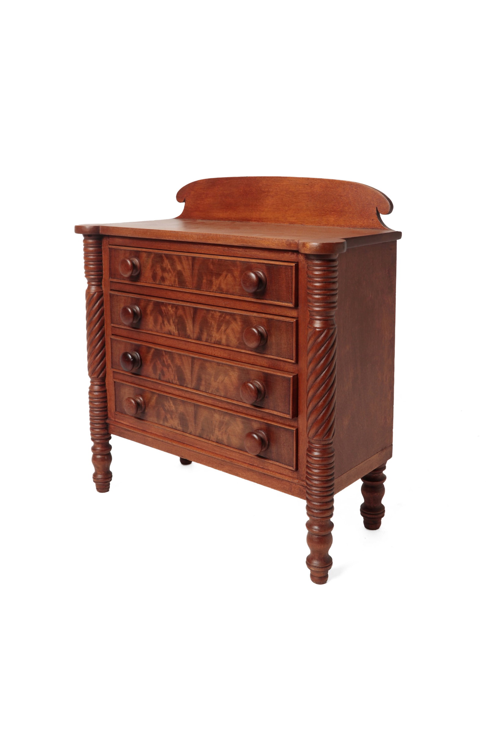 MINIATURE SHERATON CHEST WITH BISCUIT CORNERS.: MINIATURE SHERATON CHEST WITH BISCUIT CORNERS. American, 19th Century. Birch with pine secondary. Single-board top with biscuit corners, backsplash with scrolled ends, solid ends, rope-turned
