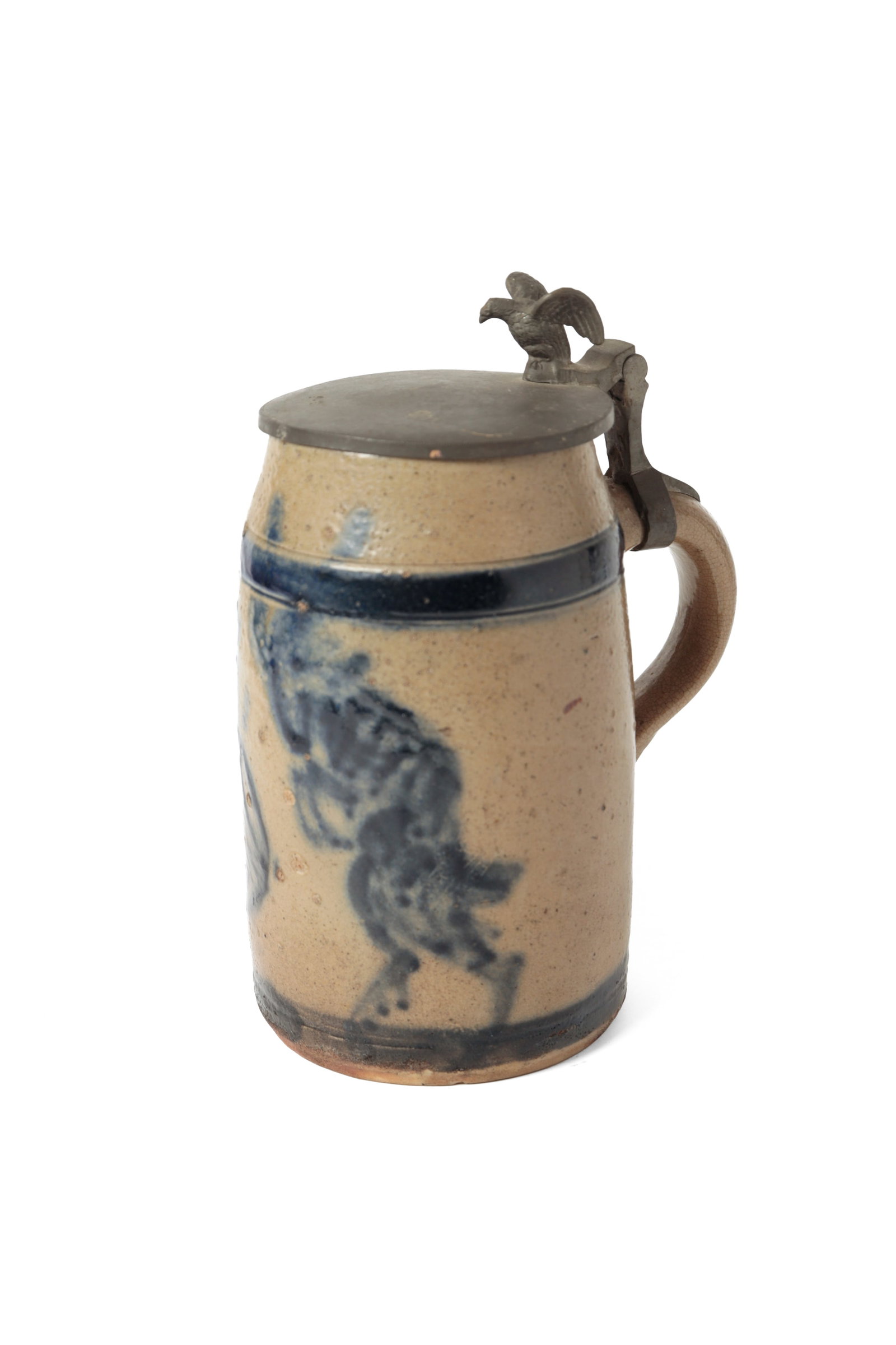 COBALT-DECORATED STONEWARE STEIN WITH PEWTER LID.: COBALT-DECORATED STONEWARE STEIN WITH PEWTER LID. American, late 19th or early 20th Century. Typical stein form, tall cylindrical body with applied handle, pewter hinged lid with an eagle finial, and 