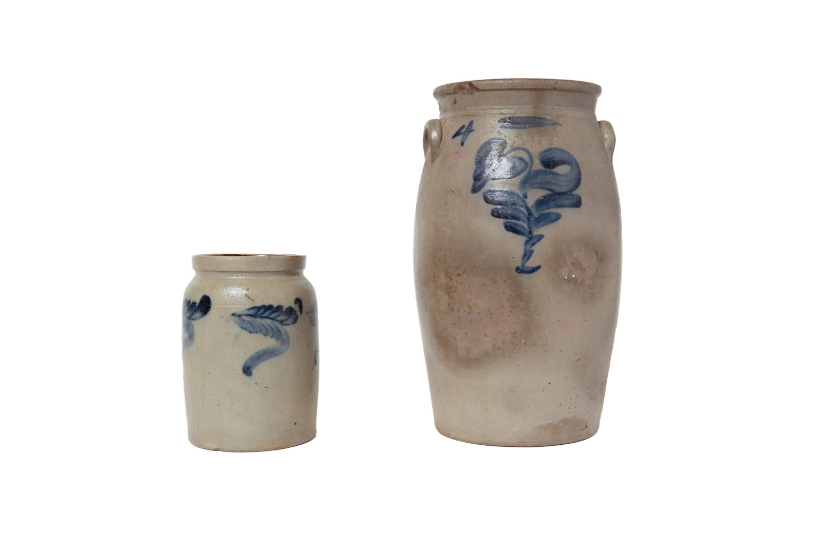 TWO STONEWARE JARS WITH FREEHAND COBALT DECORATION. (1 of 9)